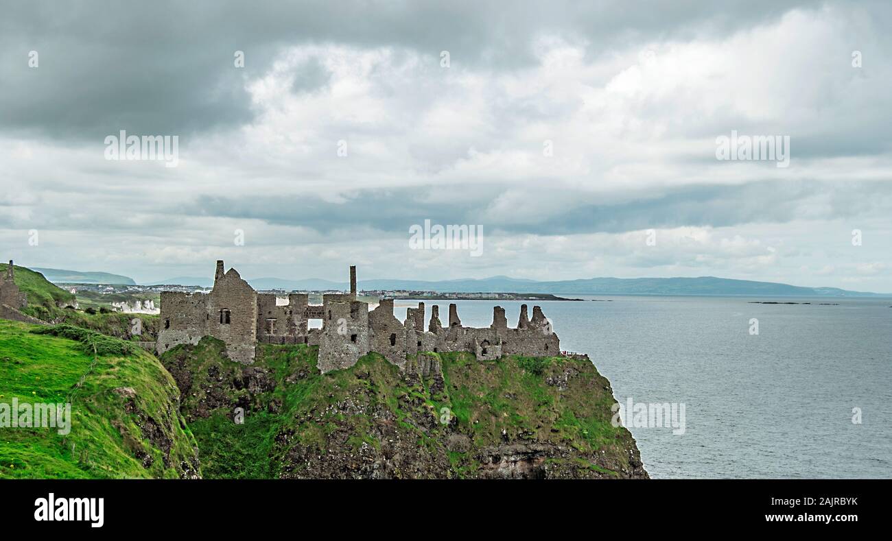 The old dunluce castle ruins in Ireland Stock Photo