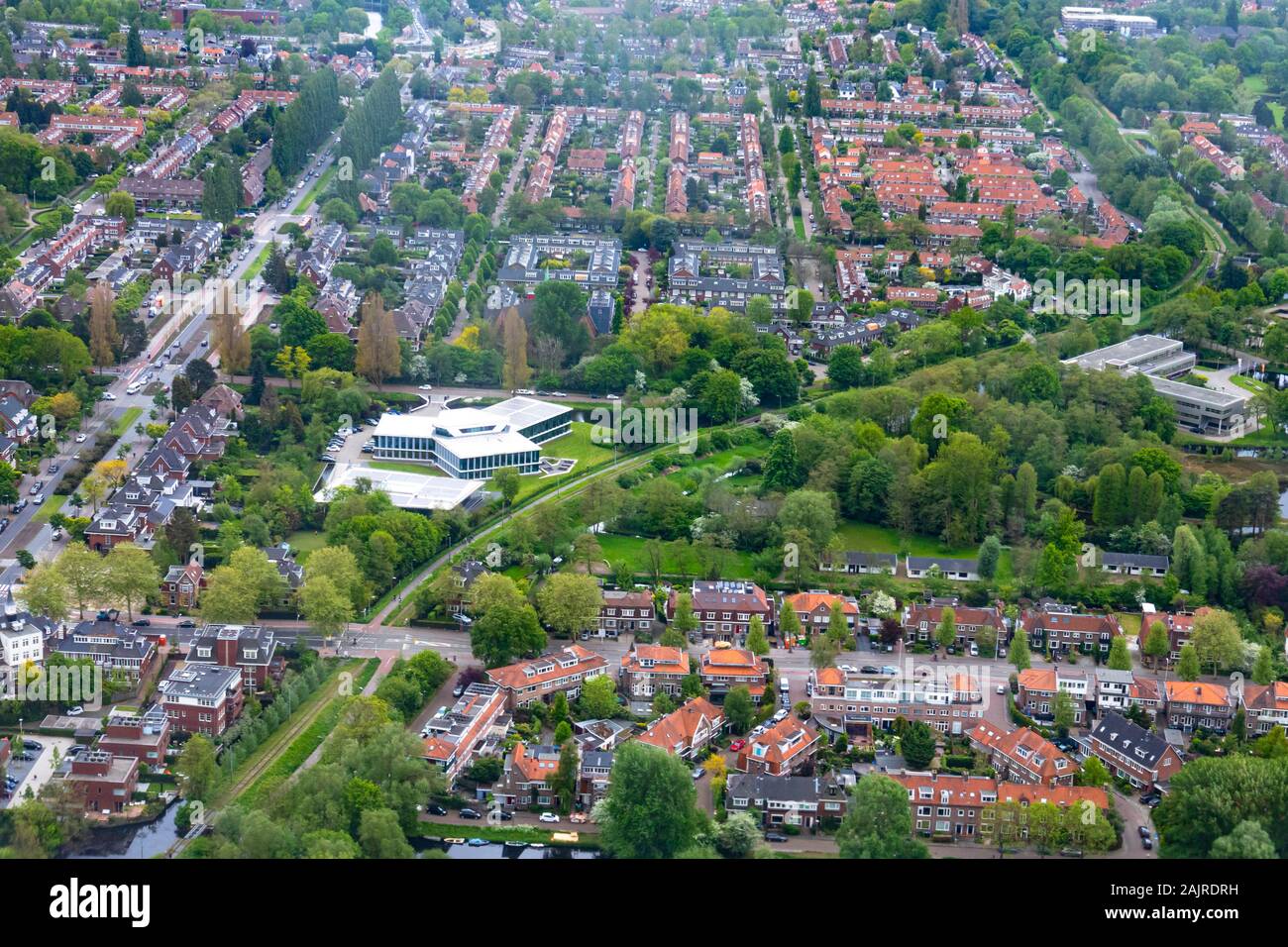 Aerial view of Amsterdam city outside Schiphol airport during flight ...