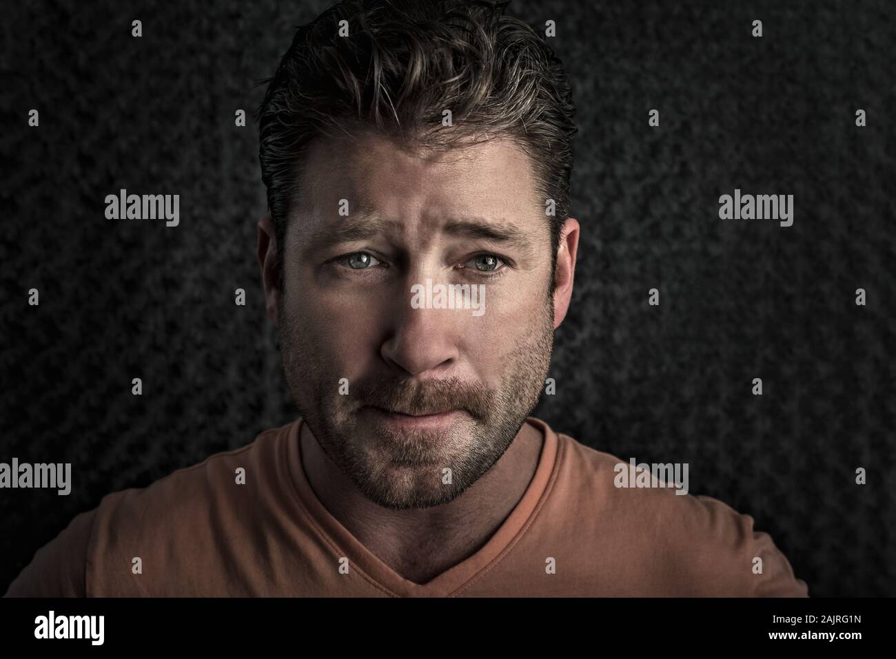 pensive, worried, male portrait on seamless background Stock Photo