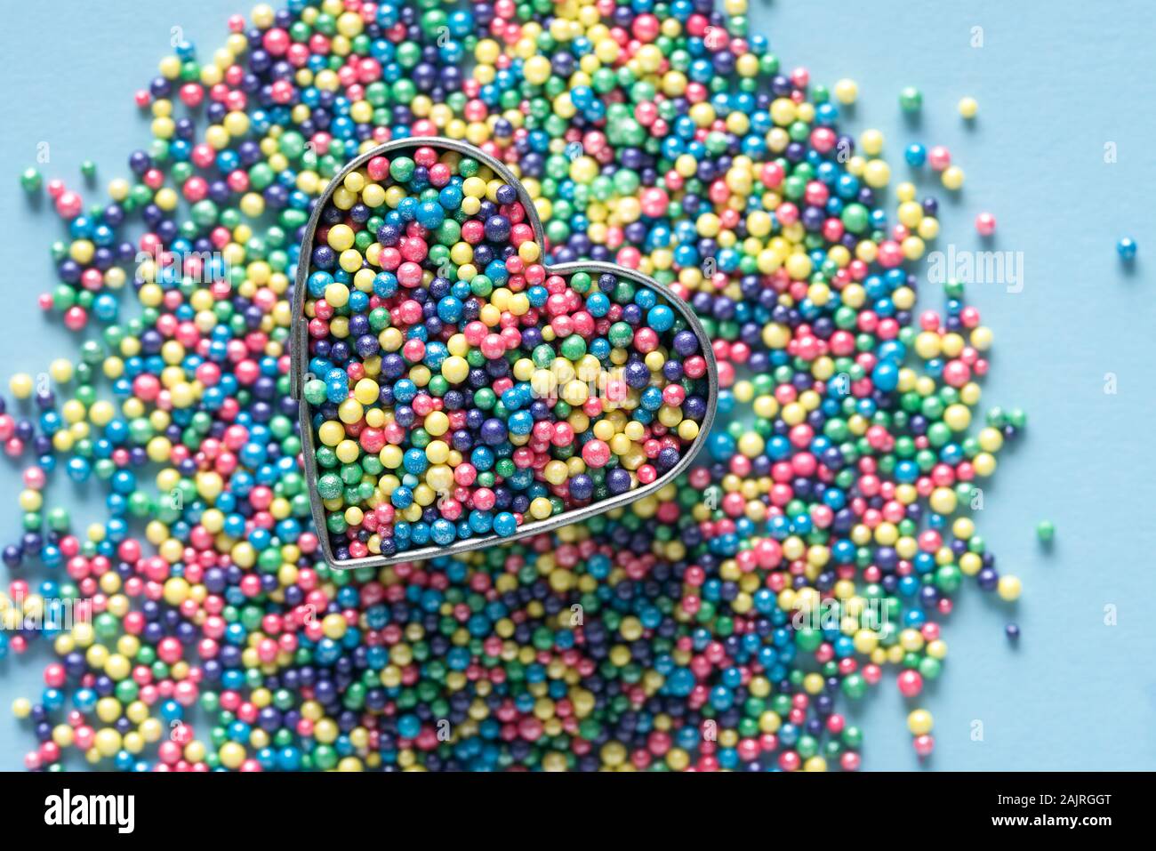 Candy Sprinkles in a Heart Shape Stock Photo