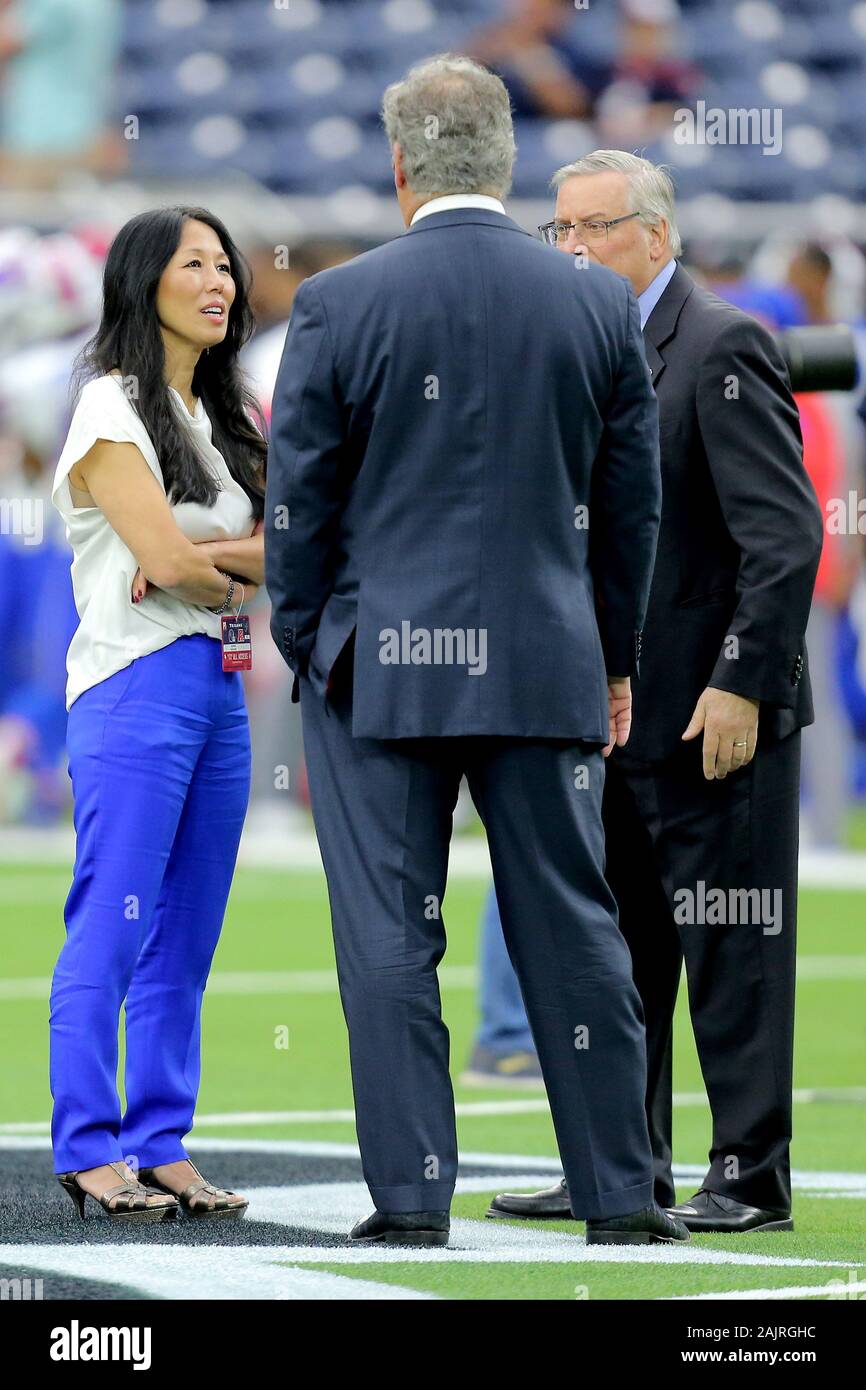 Houston, Texas, USA. 4th Jan, 2020. Buffalo Bills co-owner and president  Kim Pegula (left) speaks with Houston Texans owner Cal McNair (middle)  prior to the AFC Wild Card playoff game between the