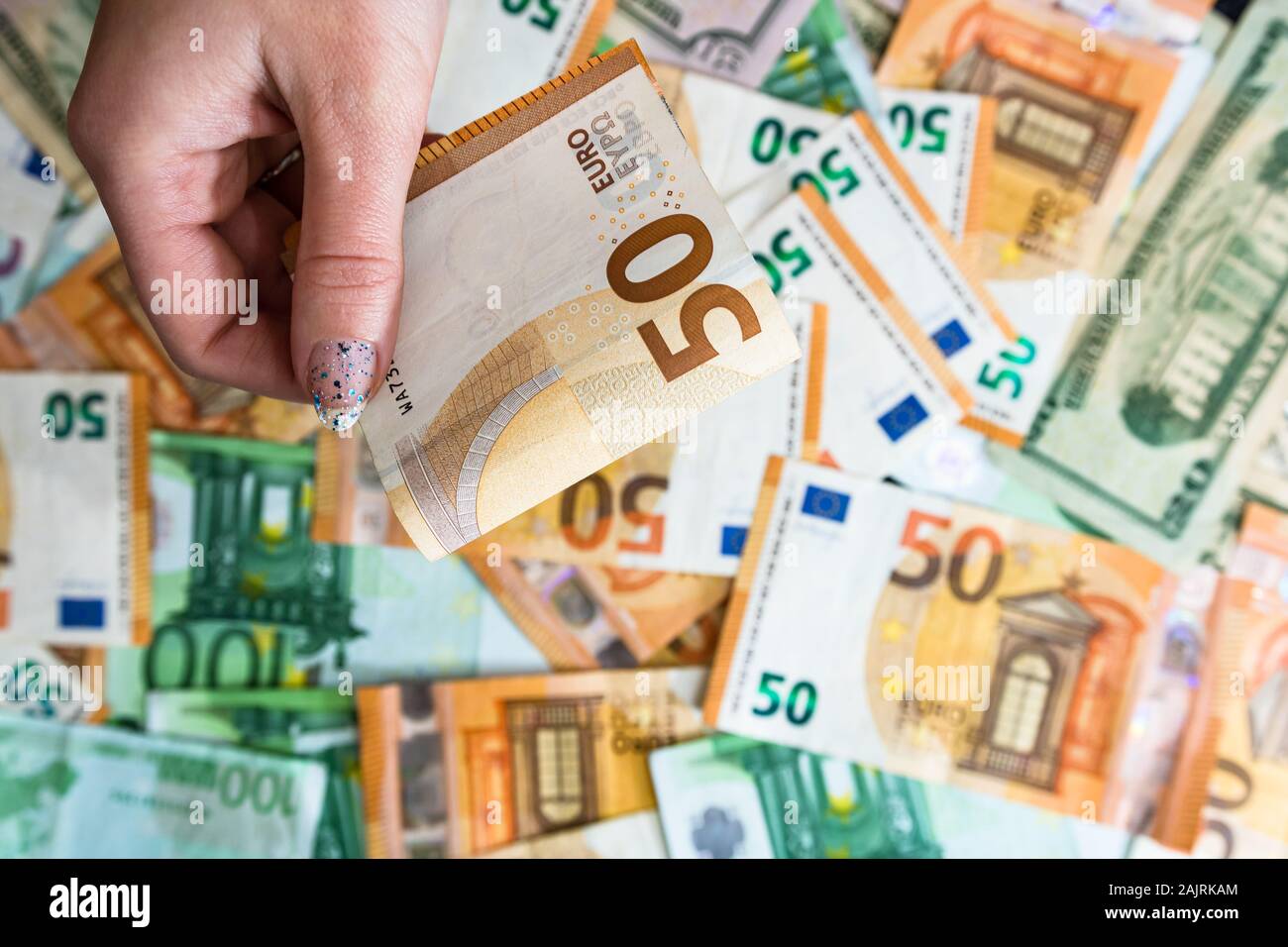 Hand Giving Money Like Bribe Or Tips Isolated On Banknotes