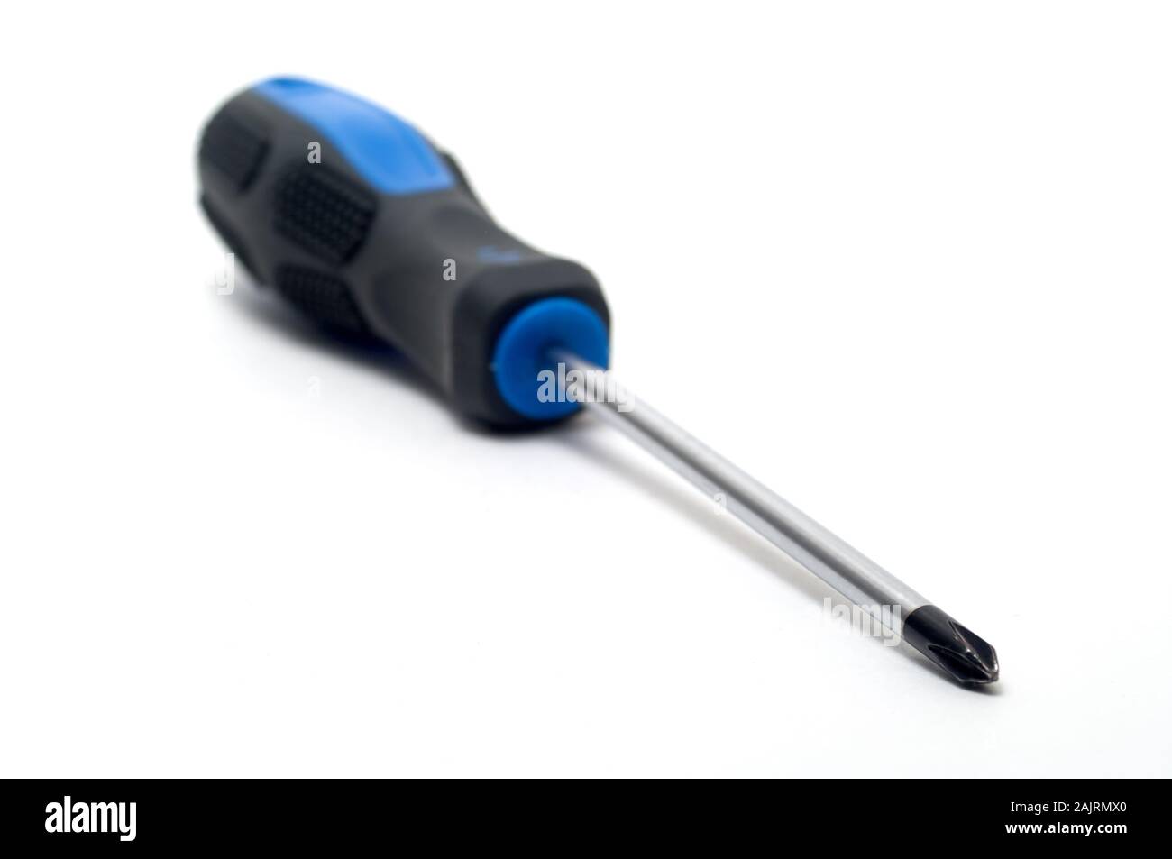 Metal cross tip screwdriver with the rubber blue handle isolated on