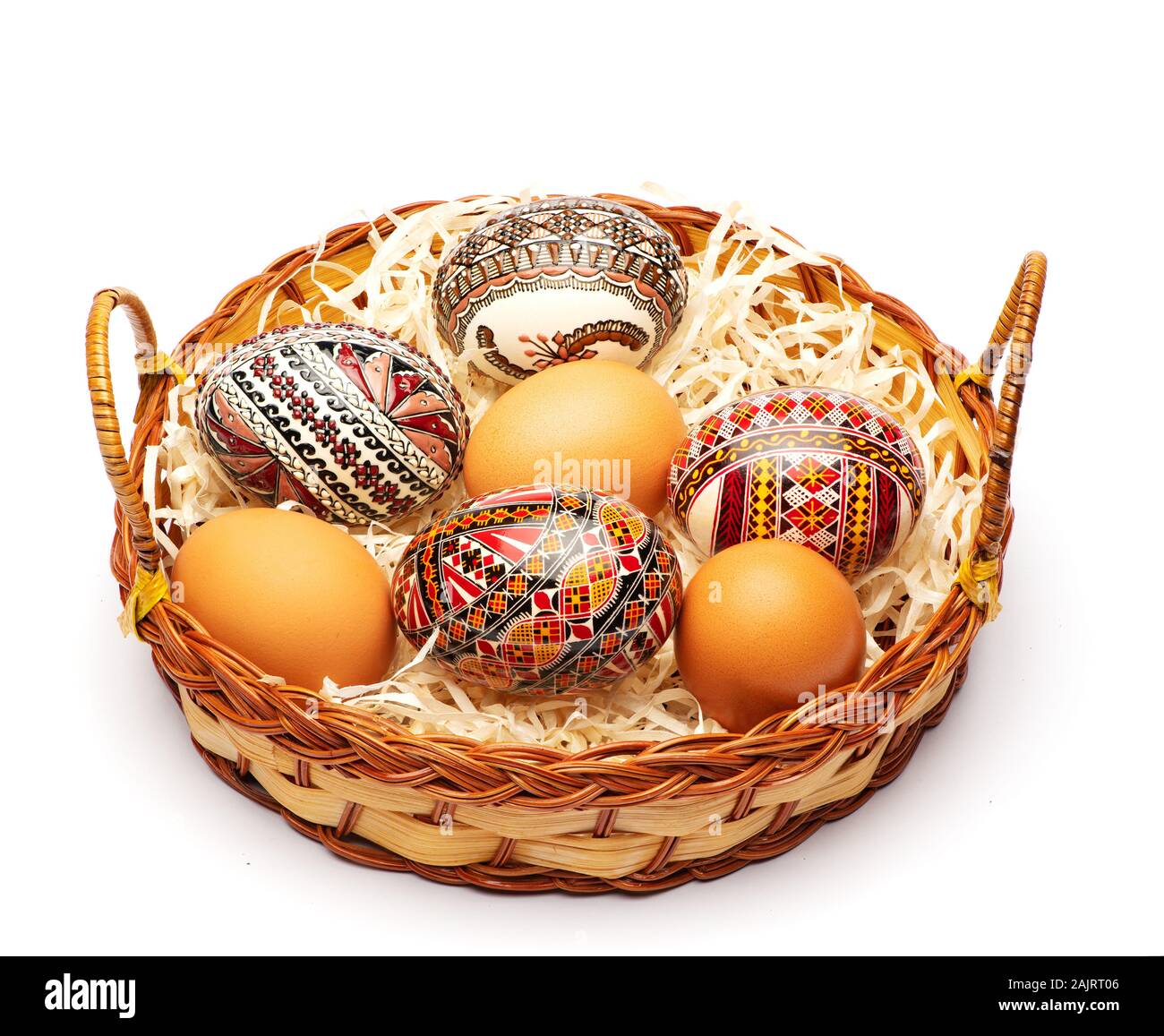 Basket with different easter eggs mint on an isolated white background Stock Photo