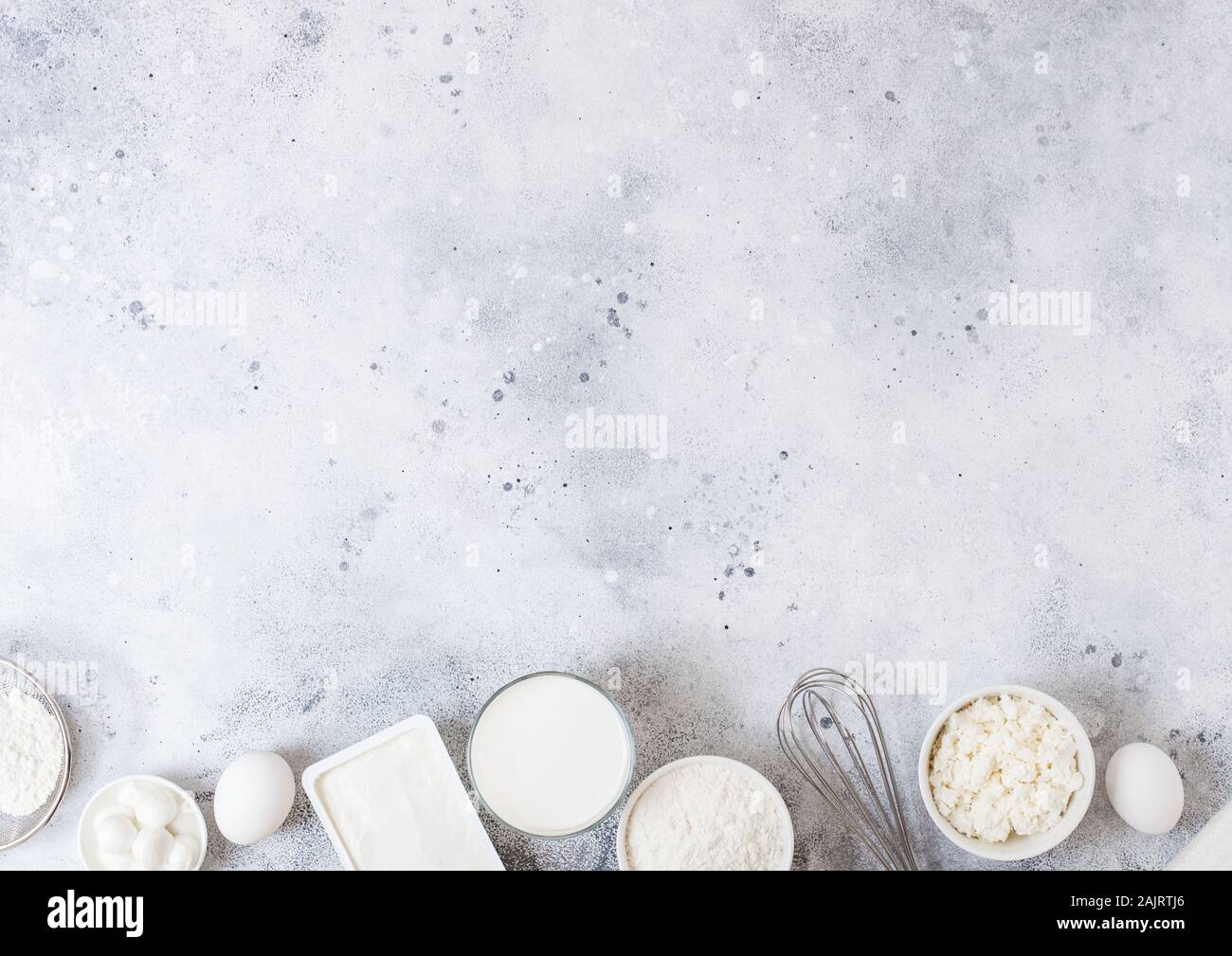 Fresh Dairy Products On White Table Background Glass Of Milk