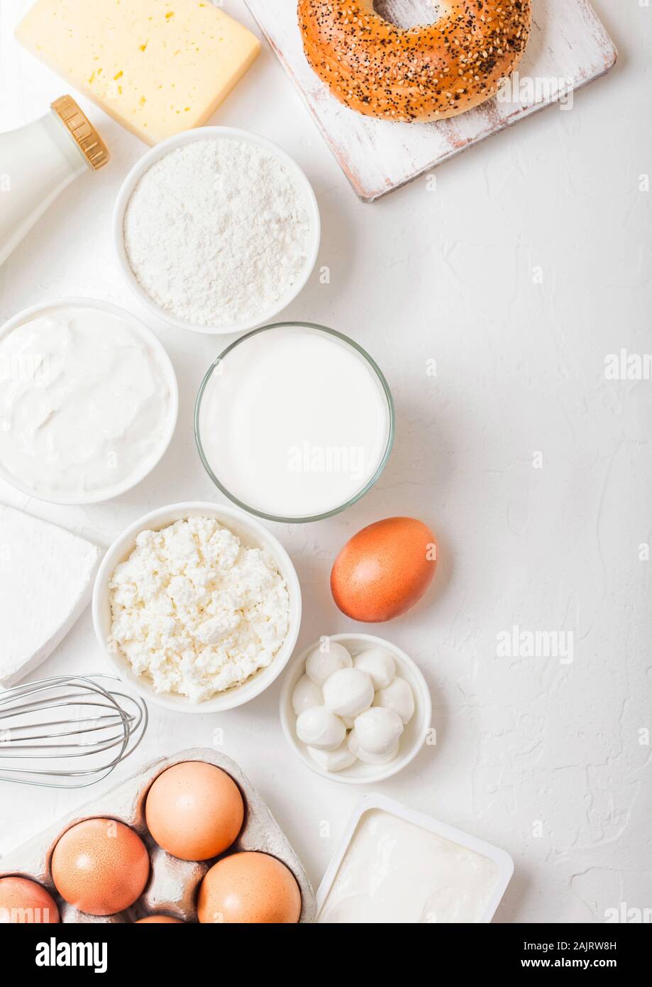 Fresh Dairy Products On White Table Background Glass Of Milk
