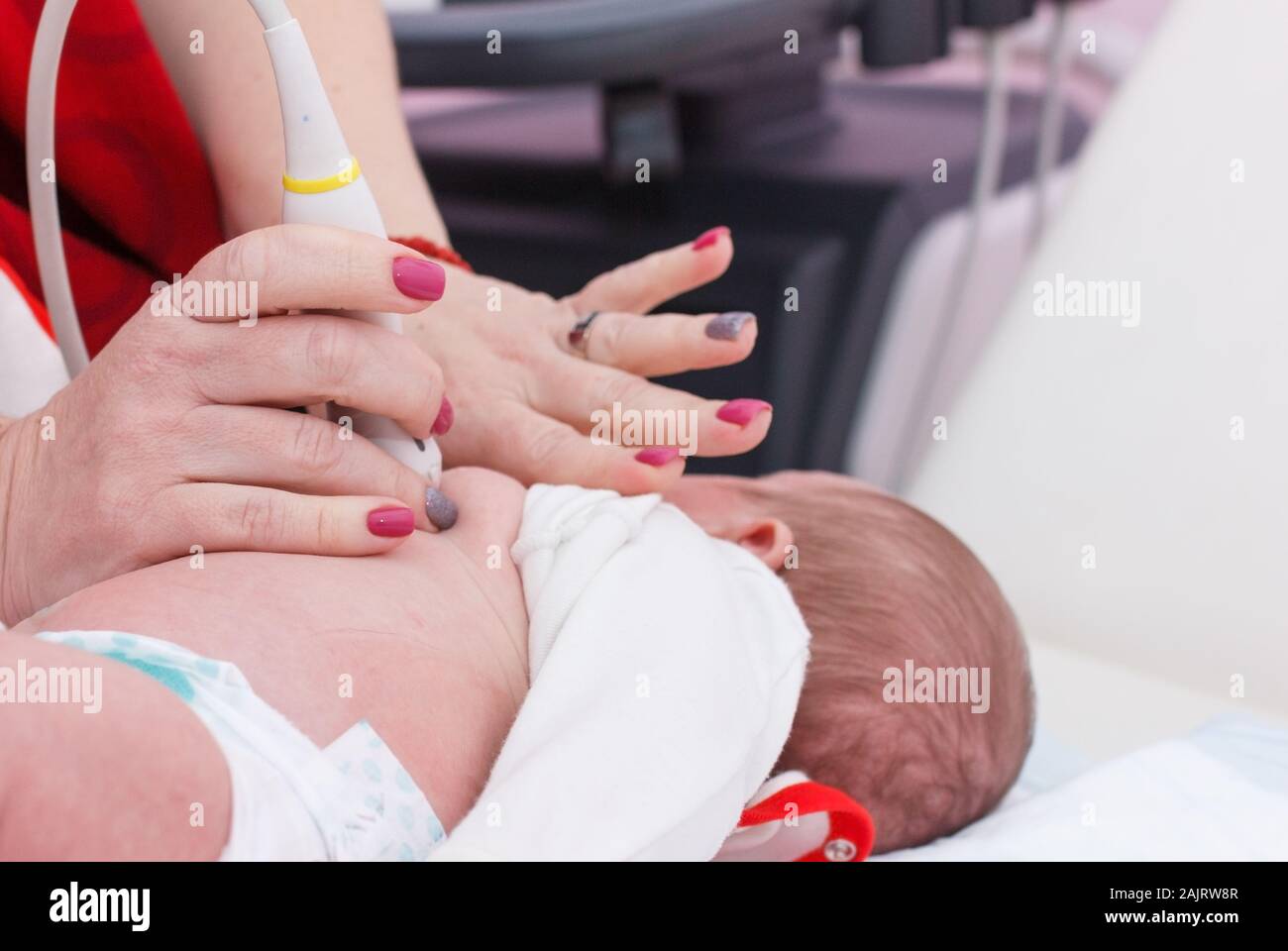 Ultrasound examination of the heart. Examination of a month old baby Stock Photo
