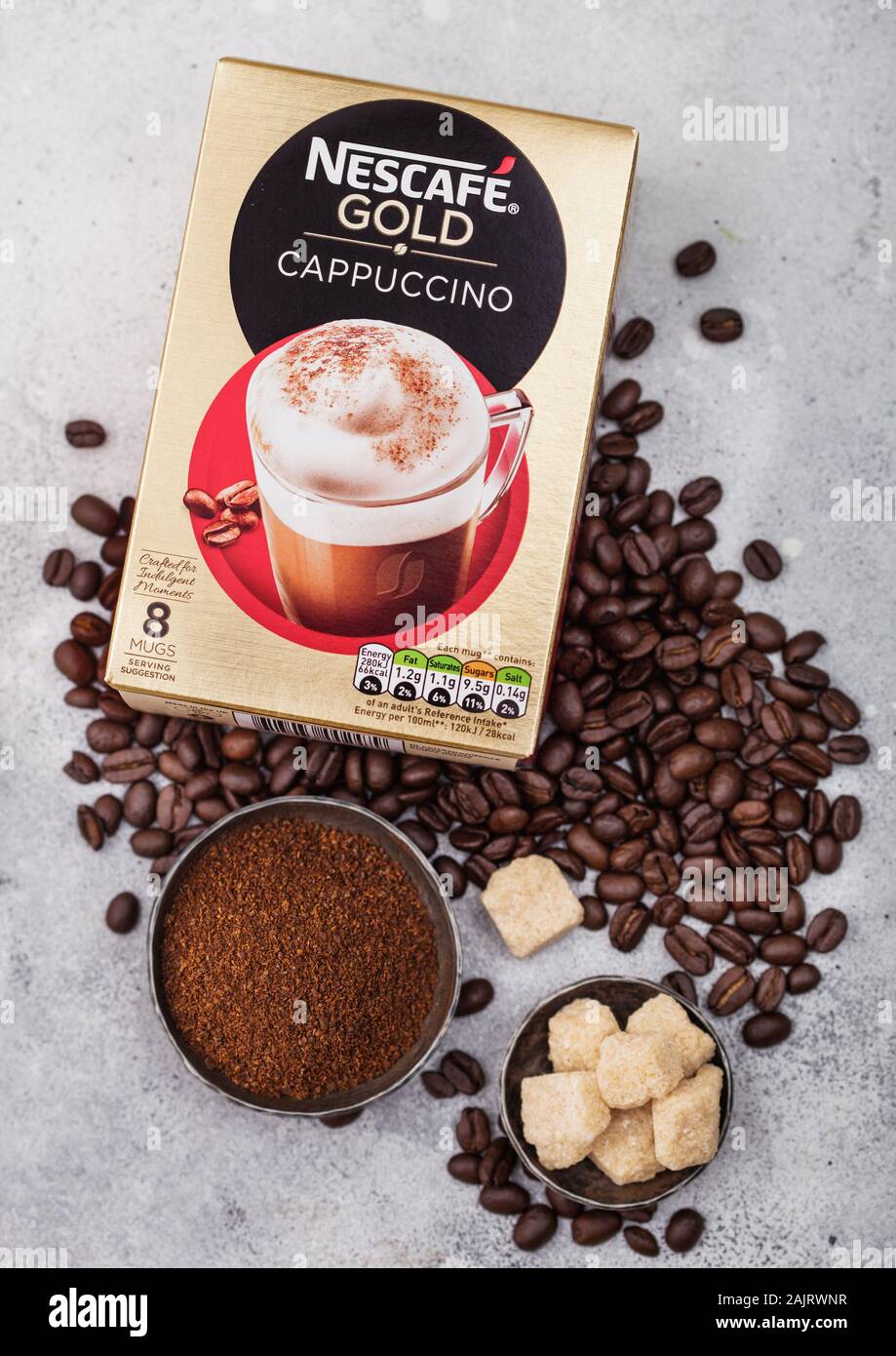 https://c8.alamy.com/comp/2AJRWNR/london-uk-august-15-2019-pack-of-nescafe-gold-cappuccino-with-coffee-beans-and-sugar-cubes-on-light-background-2AJRWNR.jpg
