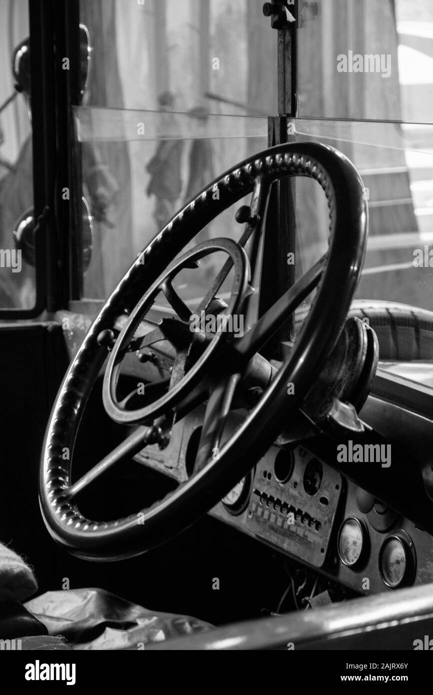 Classic vehicle steering wheel in black and white from Daimler shooting vehicle commissioned by King George V Stock Photo