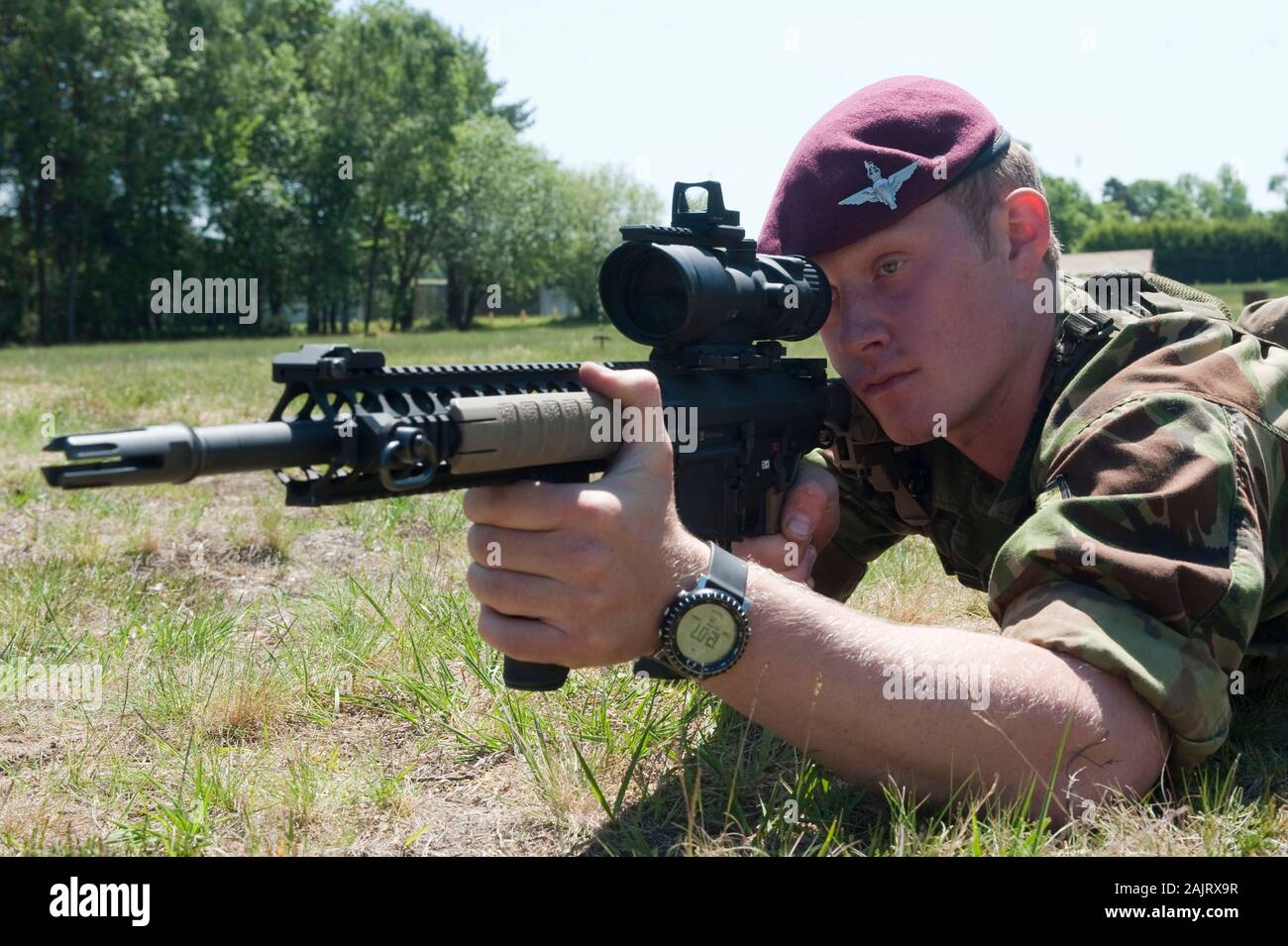 A member of 2 Para parachute regiment due to be deployed to Afghanistan in September pictured with the recently introduced Sharpshooter rifle. Stock Photo