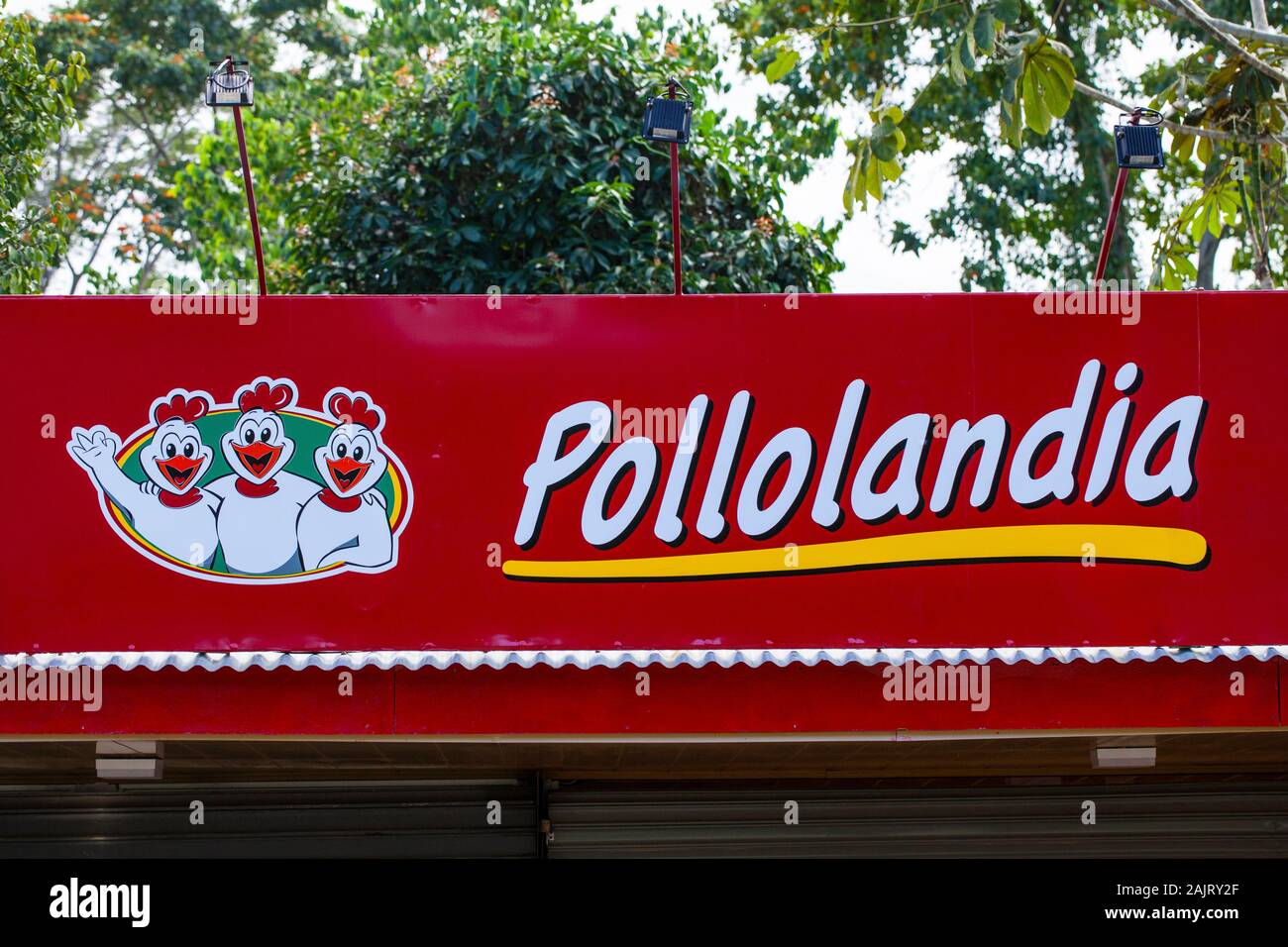 Talamankos Puerto Vjechas/Costa Rica - January01, 2019: 'Pollolandia' - cheap eats, easy menu, delicious chicken. Popular fast food restaurant sign in Stock Photo
