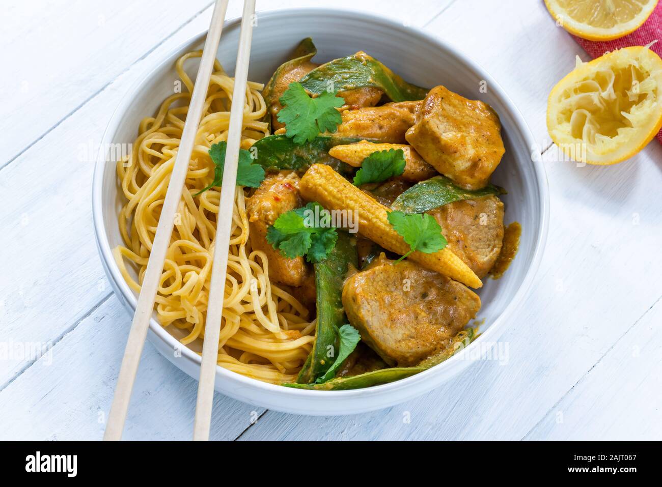 Satay pork curry with egg noodles Stock Photo Alamy