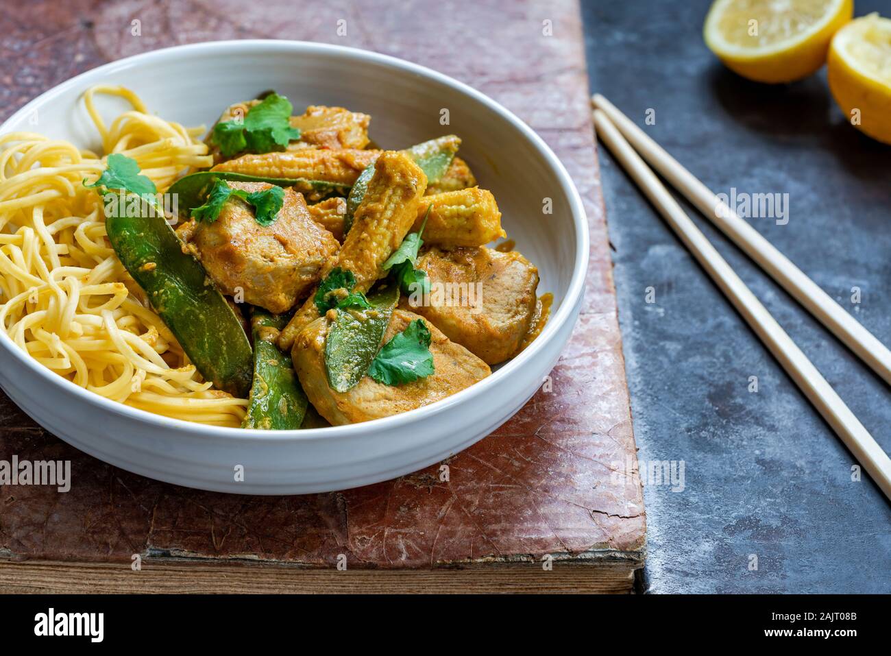 Satay pork curry with egg noodles Stock Photo Alamy