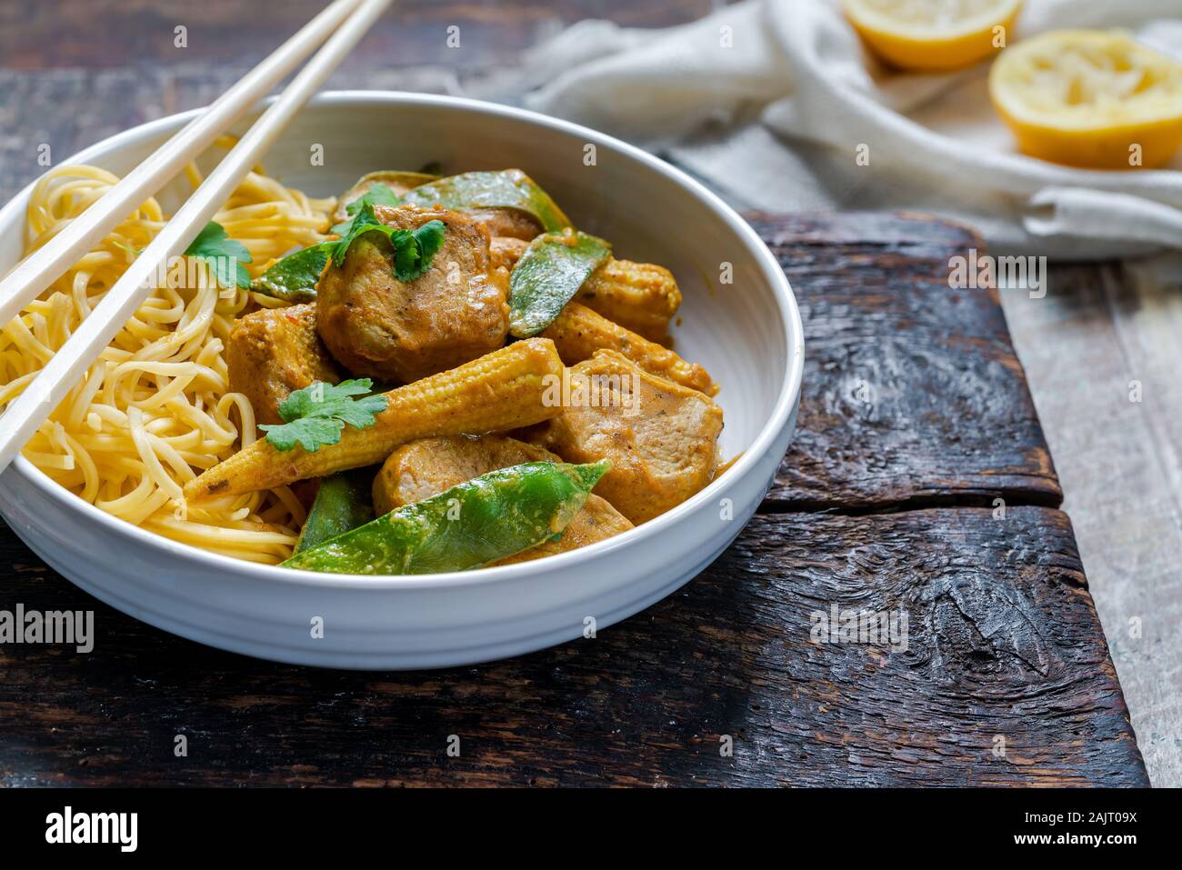 Satay pork curry with egg noodles Stock Photo Alamy