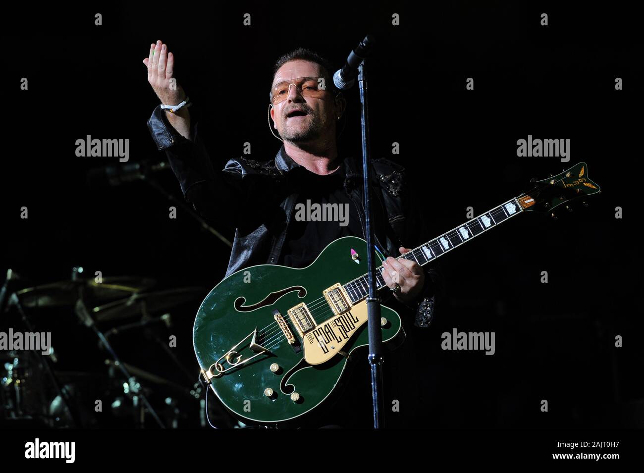 Milan Italy ,07 July 2009 ,Live concert of U2 at the Stadio Meazza San Siro : The singer and guitarist of U2 Bono during the concert Stock Photo