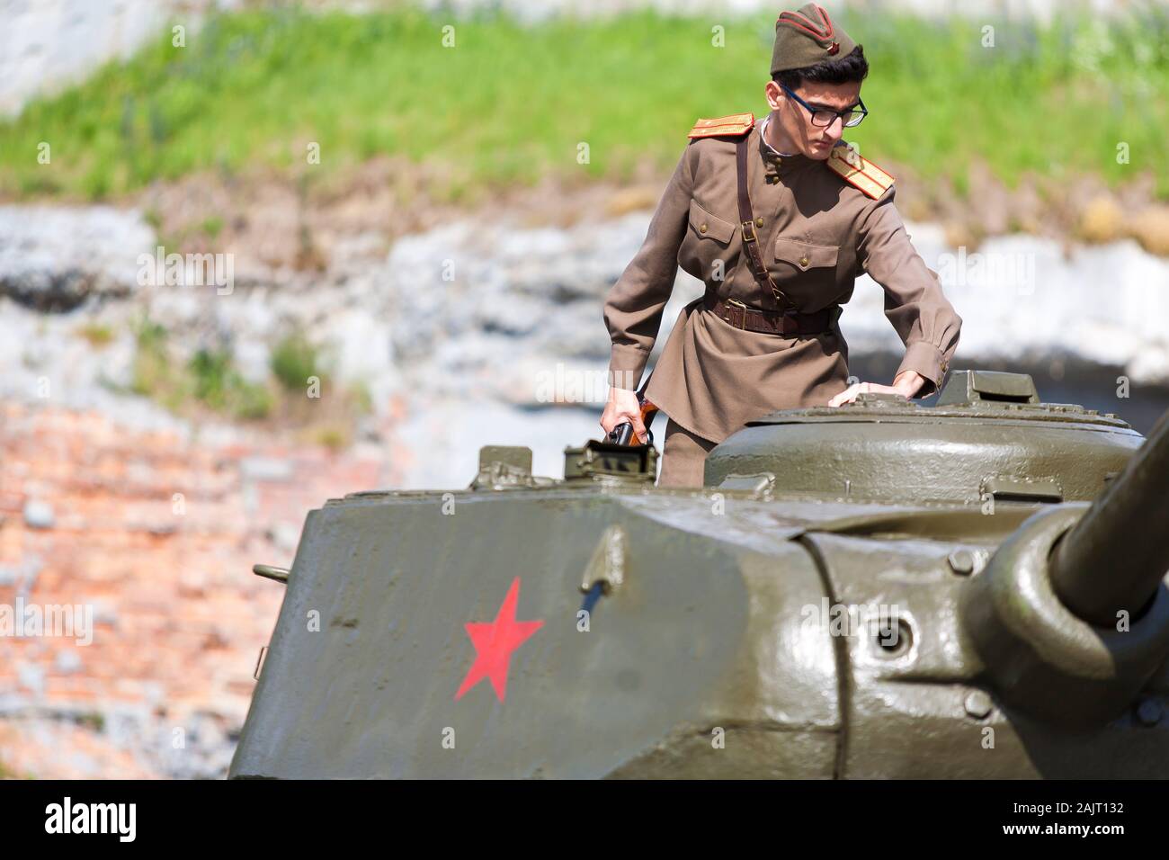 a young man dresses in World War 2 Uniform to celebrate the battle that occured at the Brest Fortress in Belarus. Stock Photo