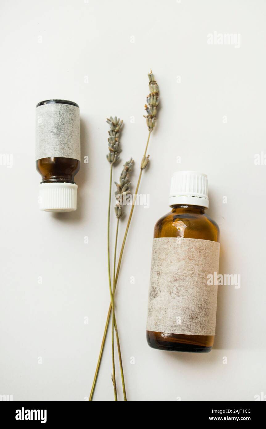 Homemade skincare cosmetics. essential oil, soap and herbs. Organic selfcare concept. Stock Photo