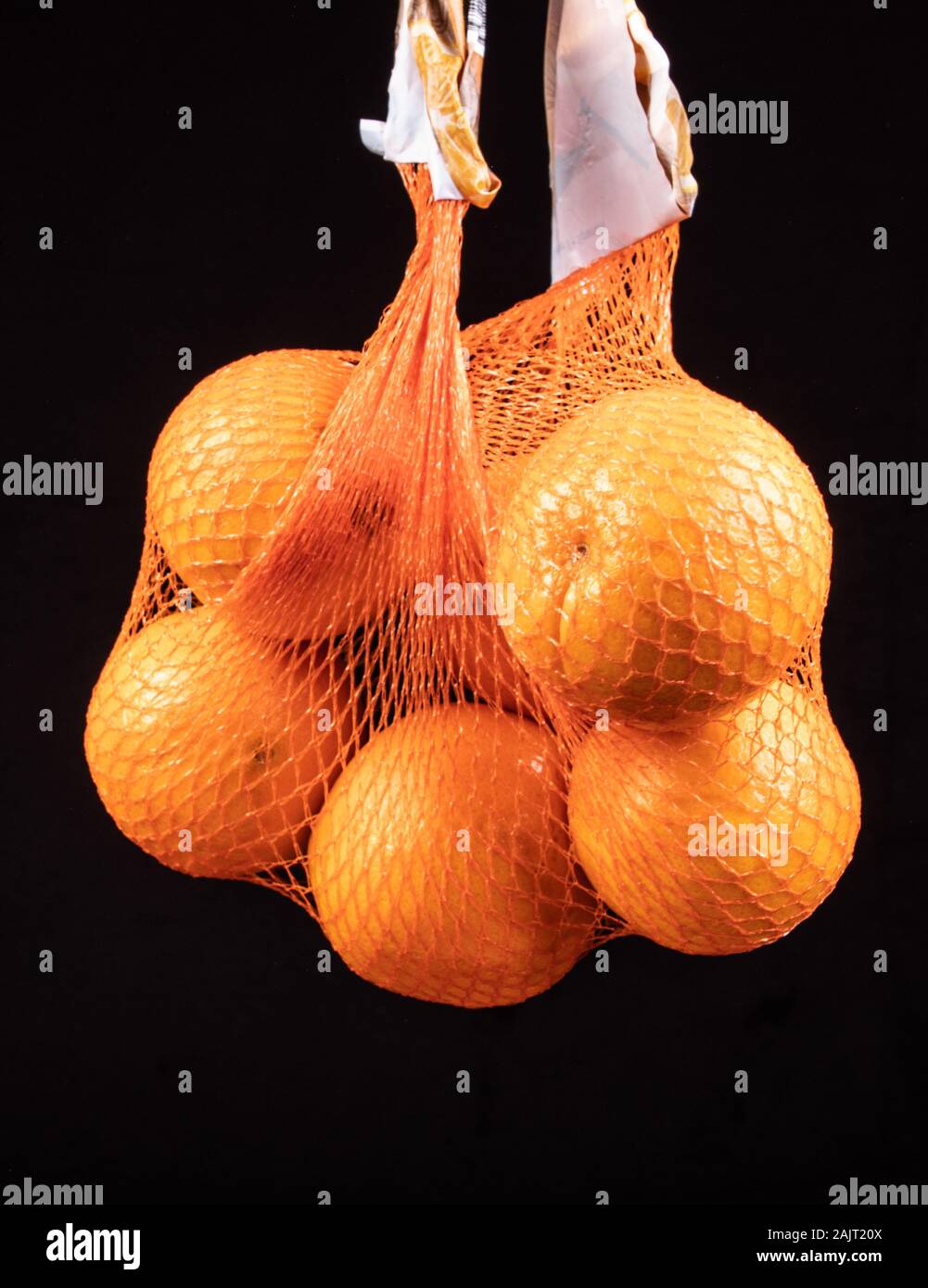 oranges in the shopping bag, net Stock Photo