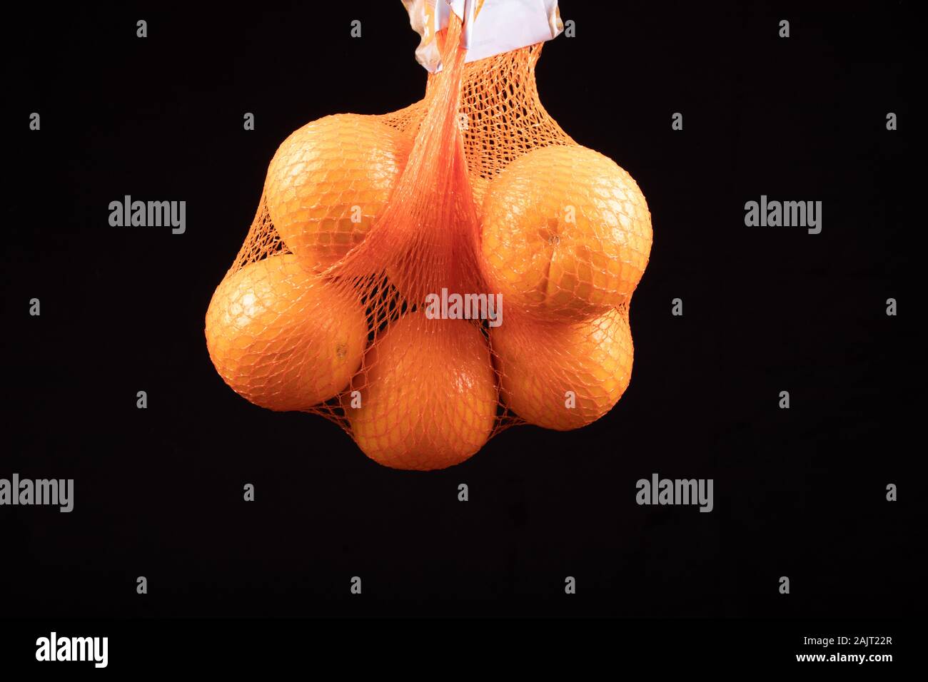 oranges in the shopping bag, net Stock Photo