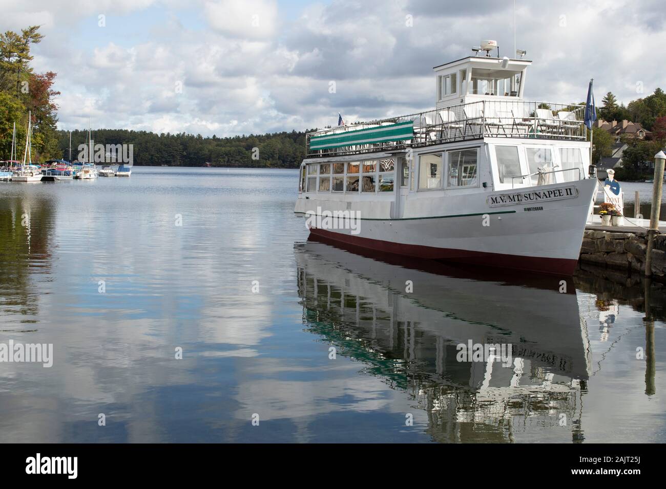 Departs from Sunapee Harbor. Narrated tours cover the history and boundaires and 3 lighthouses on the lake. 2 boats serve the lake and also offer a ni Stock Photo