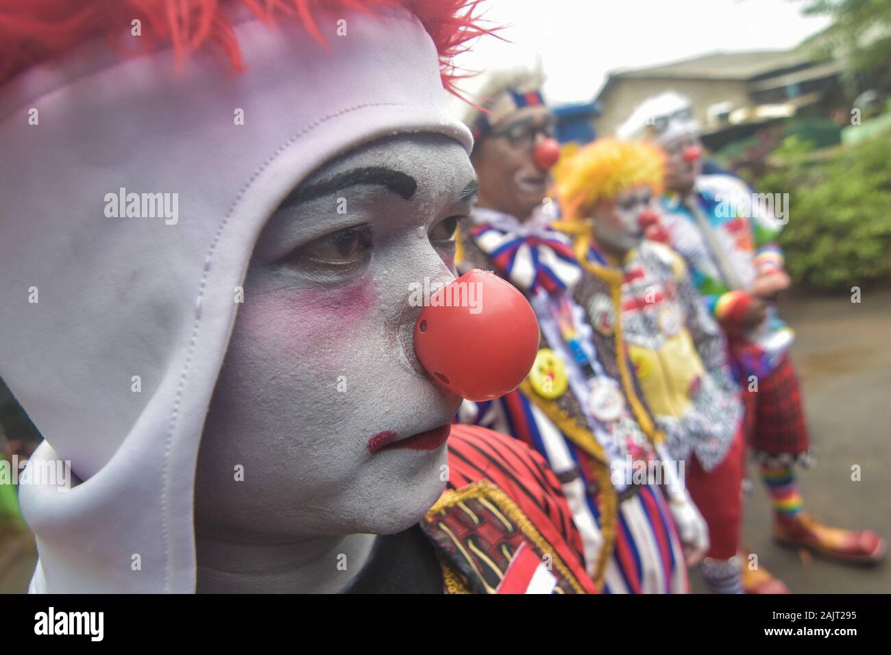 The Community “Aku Badut Indonesia” (I am Indonesian Clown) entertains a number of children affected by the floods that following torrential rains since the past 5 days. The activity is aimed at trauma healing and a form of caring for Jakarta flood victims, especially children. Stock Photo