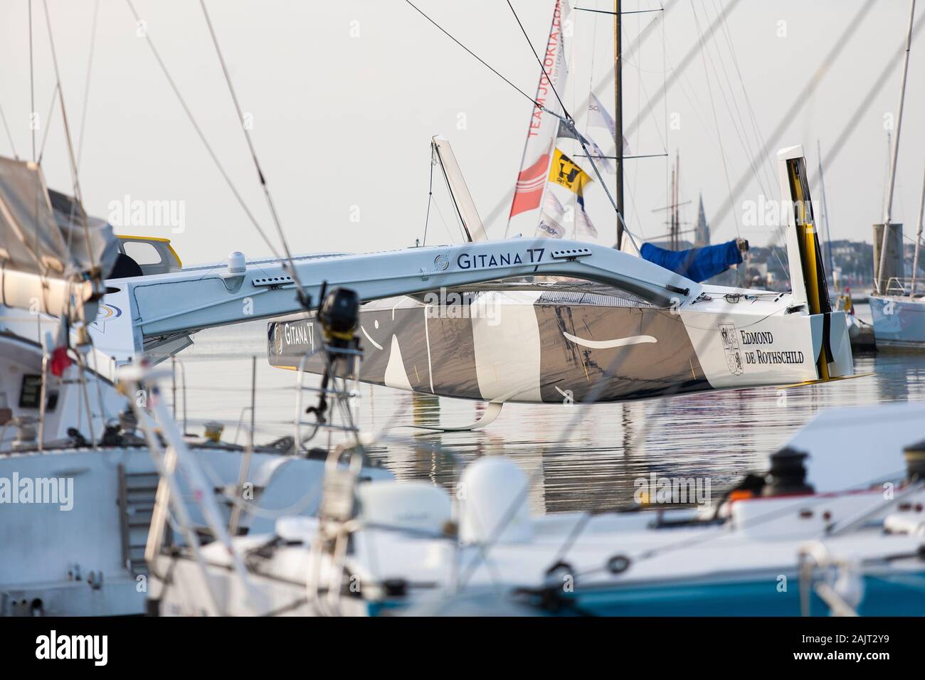 Gitana 17, a purpose built record breaking maxi multihull yacht at rest in its berth in Lorient, Western France. Sponsored by Edmond de Rothschild. Stock Photo