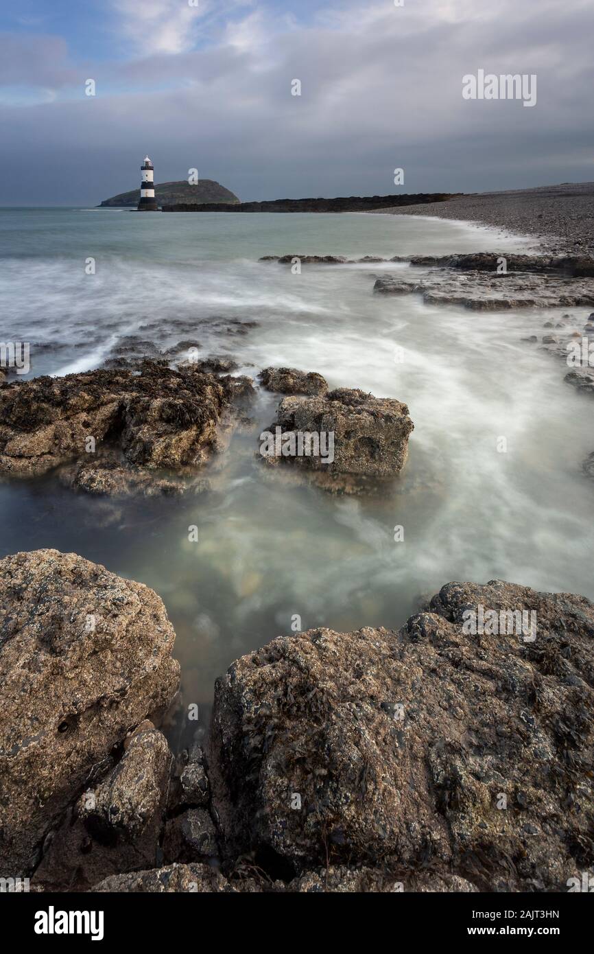Penmon Point lighthouse and Puffin Island, Anglesey, North Wales Stock Photo
