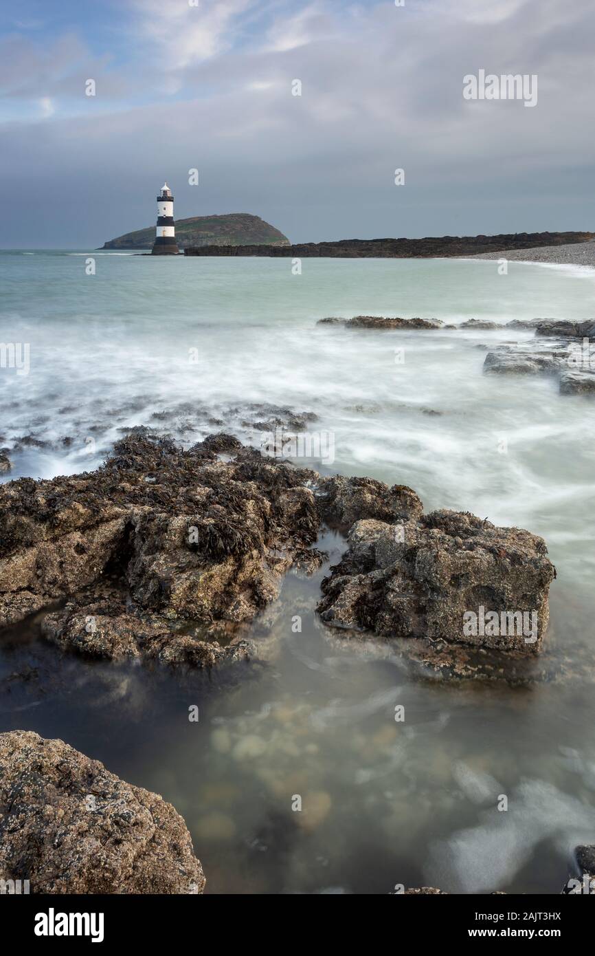 Penmon Point lighthouse and Puffin Island, Anglesey, North Wales Stock Photo