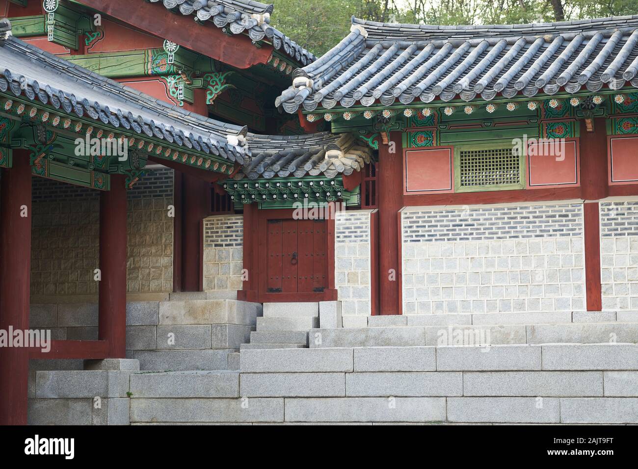Short doorway in rear of Gyeonghuigung (Gyeonghui Palace or Palace of Serene Harmony), one of the Five Grand Palaces built by the Joseon Dynasty. Stock Photo