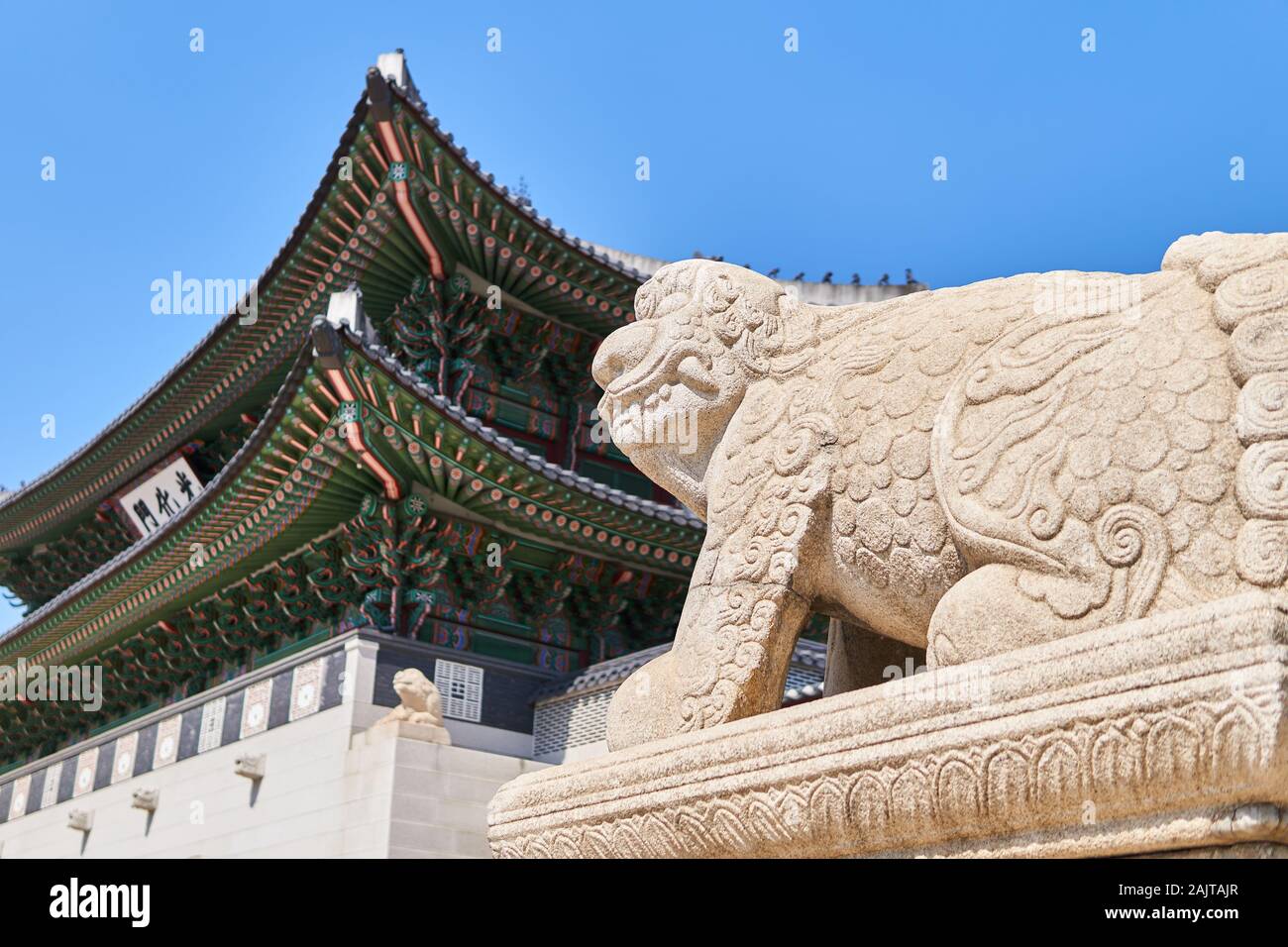 Korean Lion dog guardian (Haetae or haechi) statue on clear blue day