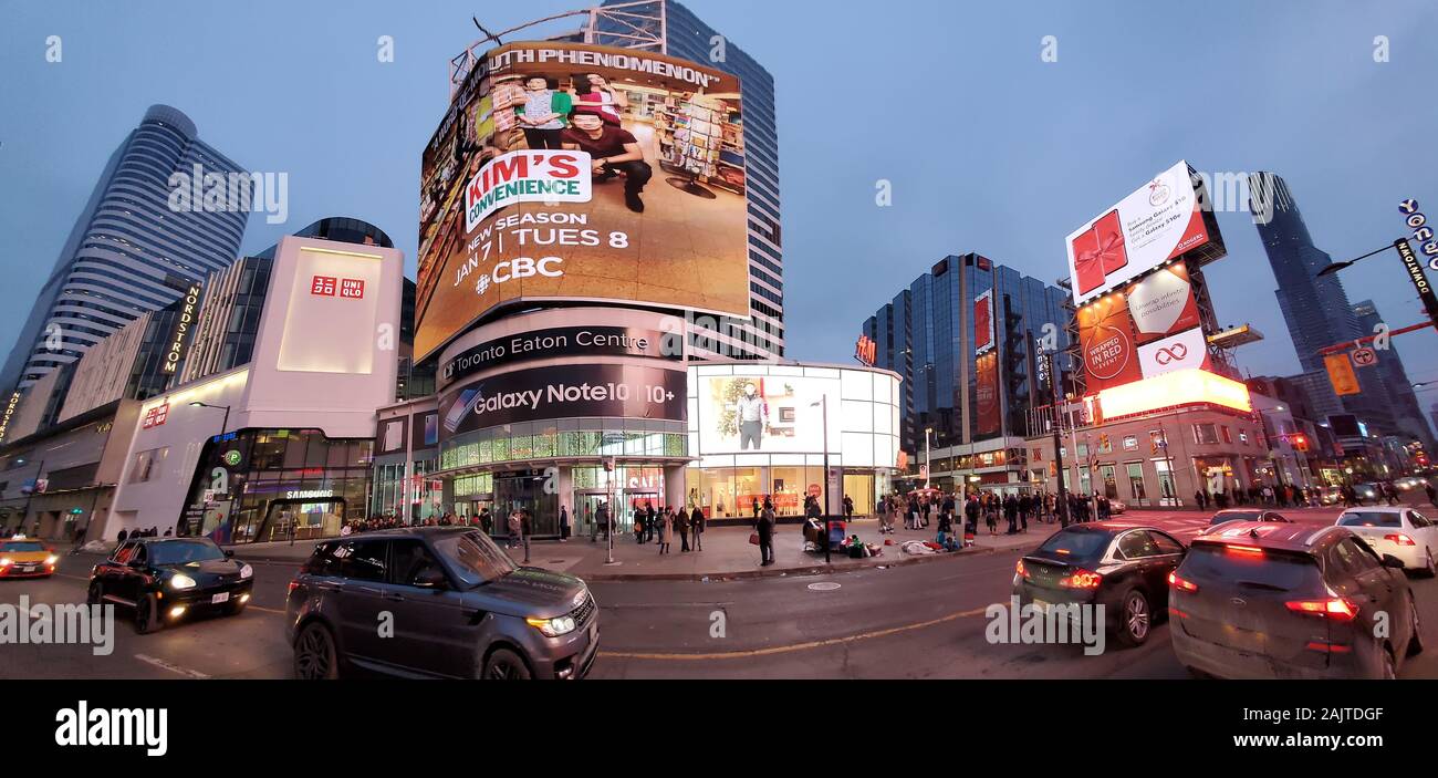 Toronto, Ontario, Canada-26 December 2019: Panoramic view of a Yonge-Dundas Square at Christmas, a public square that hosts many public events, perfor Stock Photo