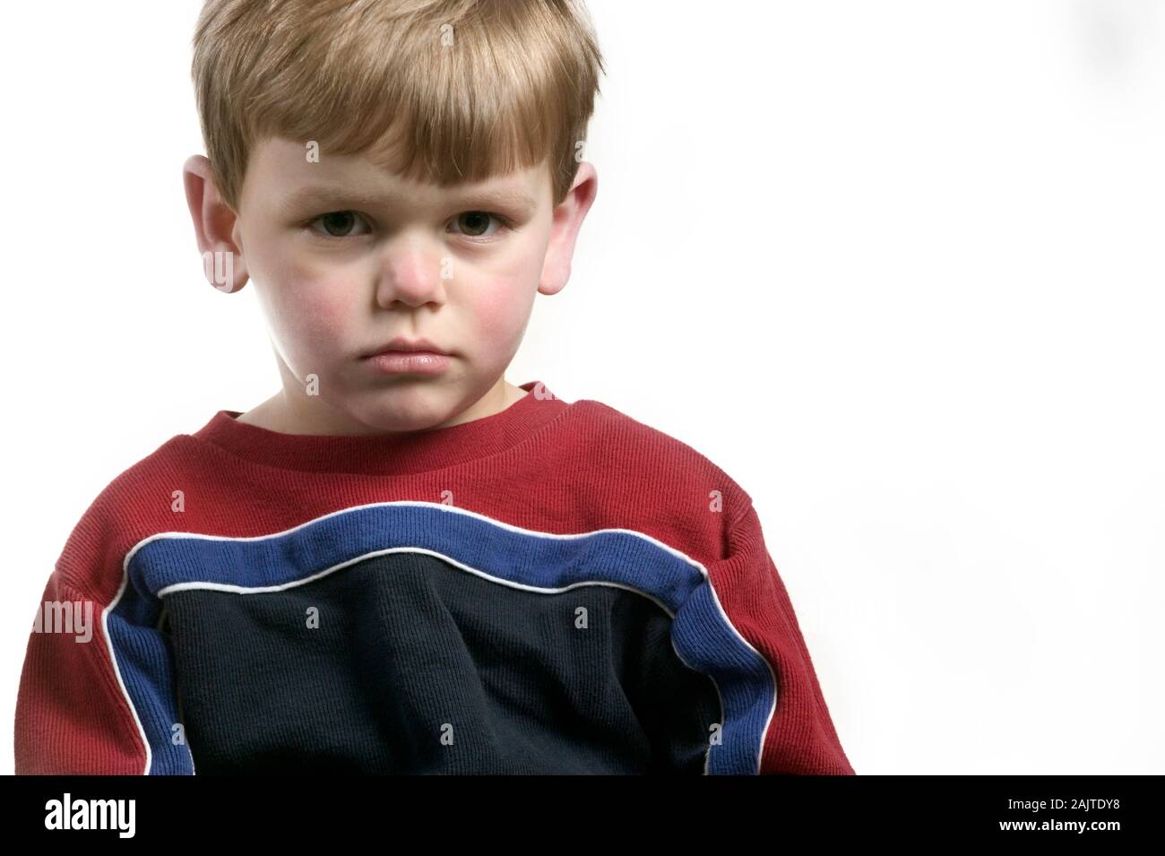 Sad little sixyearold boy with a worried expression Stock Photo Alamy