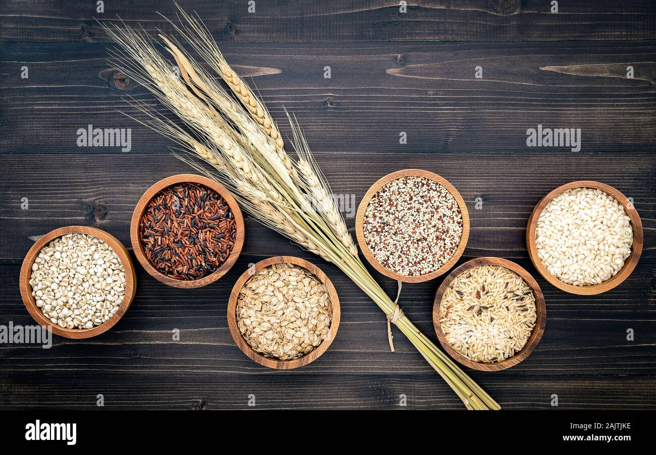 Various natural organic cereal and whole grains seed in wooden bowl for
