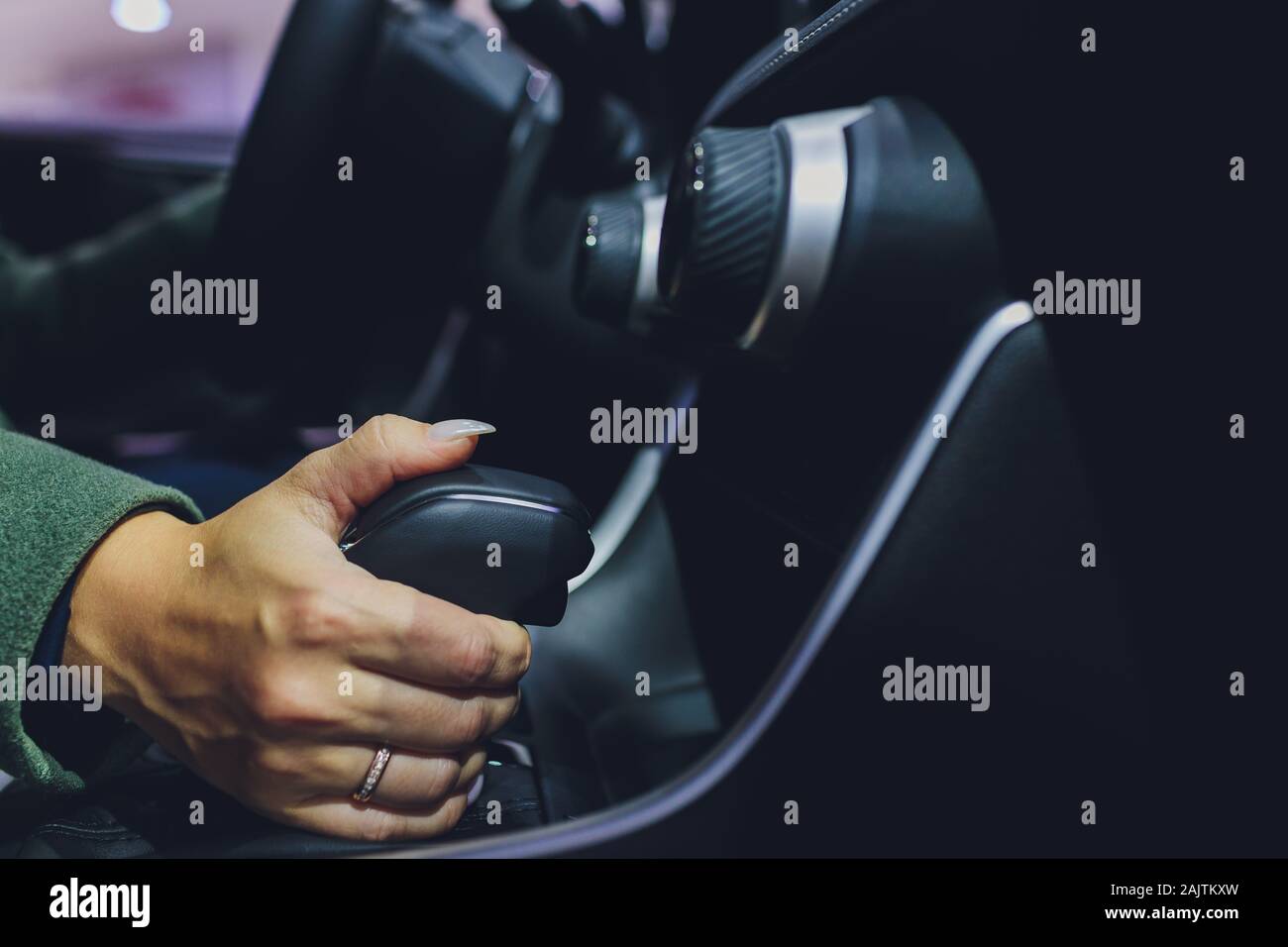 close up of woman shifting gears on gearbox in car Stock Photo Alamy