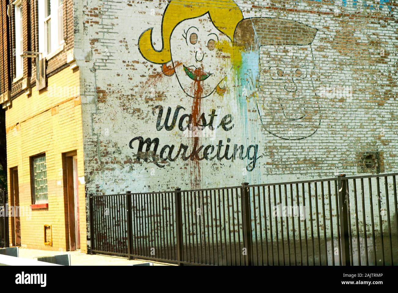A faded old sign reading 'Waste Marketing,' Hammond, Indiana, USA Stock Photo