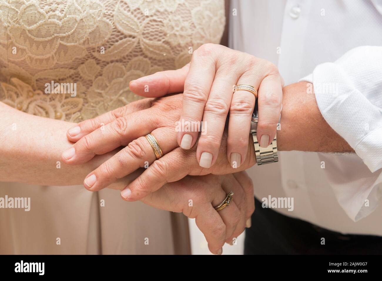 Closeup of the hands of an old couple over each other. Concept of respect, companionship, togetherness and love. Stock Photo