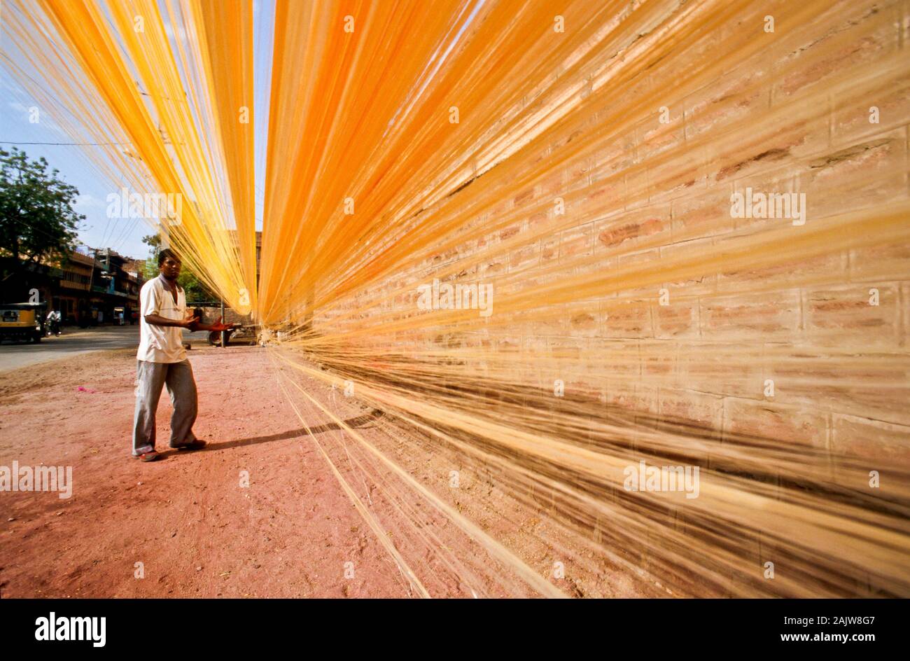 Dying threads for industrial use Stock Photo - Alamy