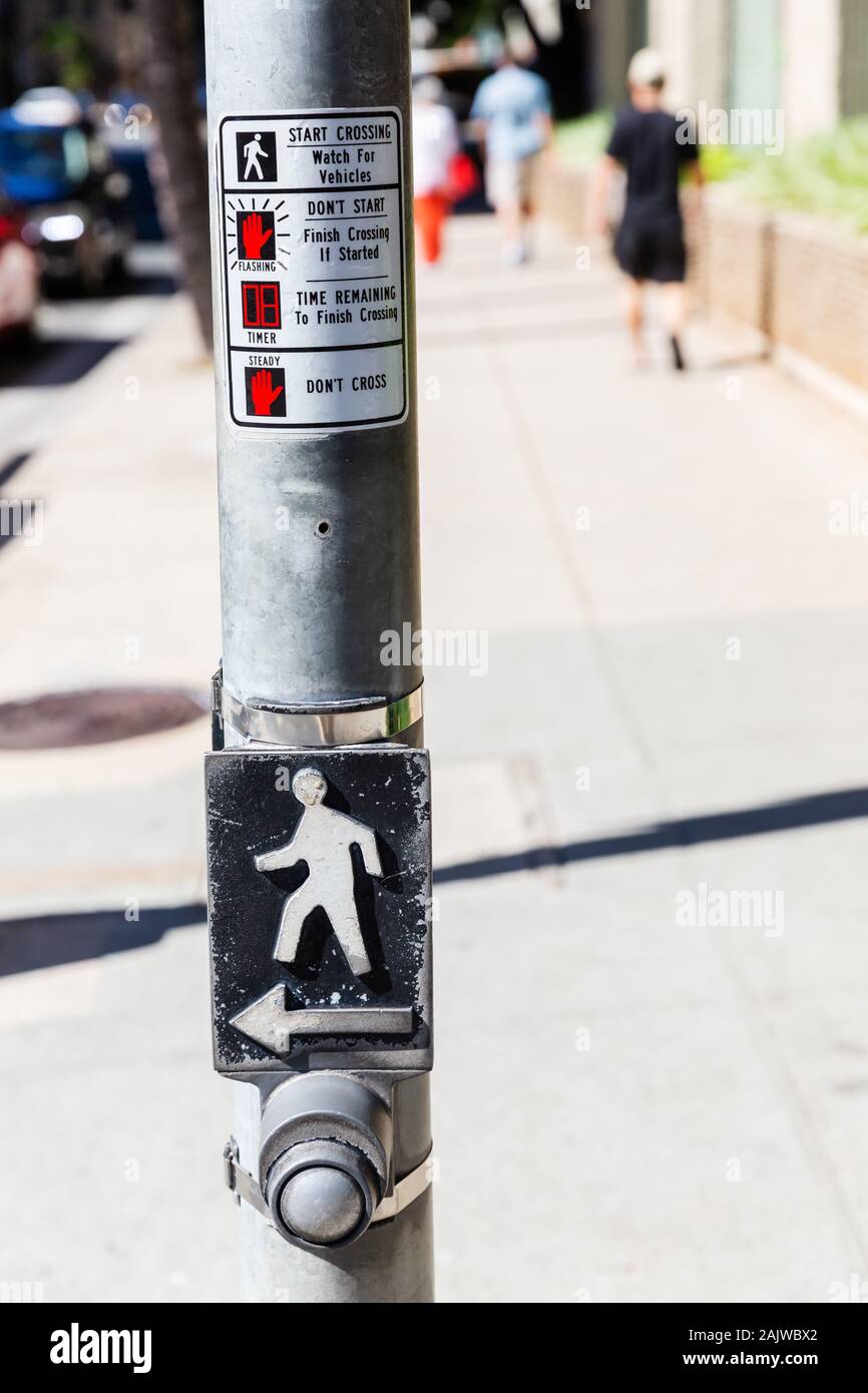 push button at a traffic lights pole Stock Photo