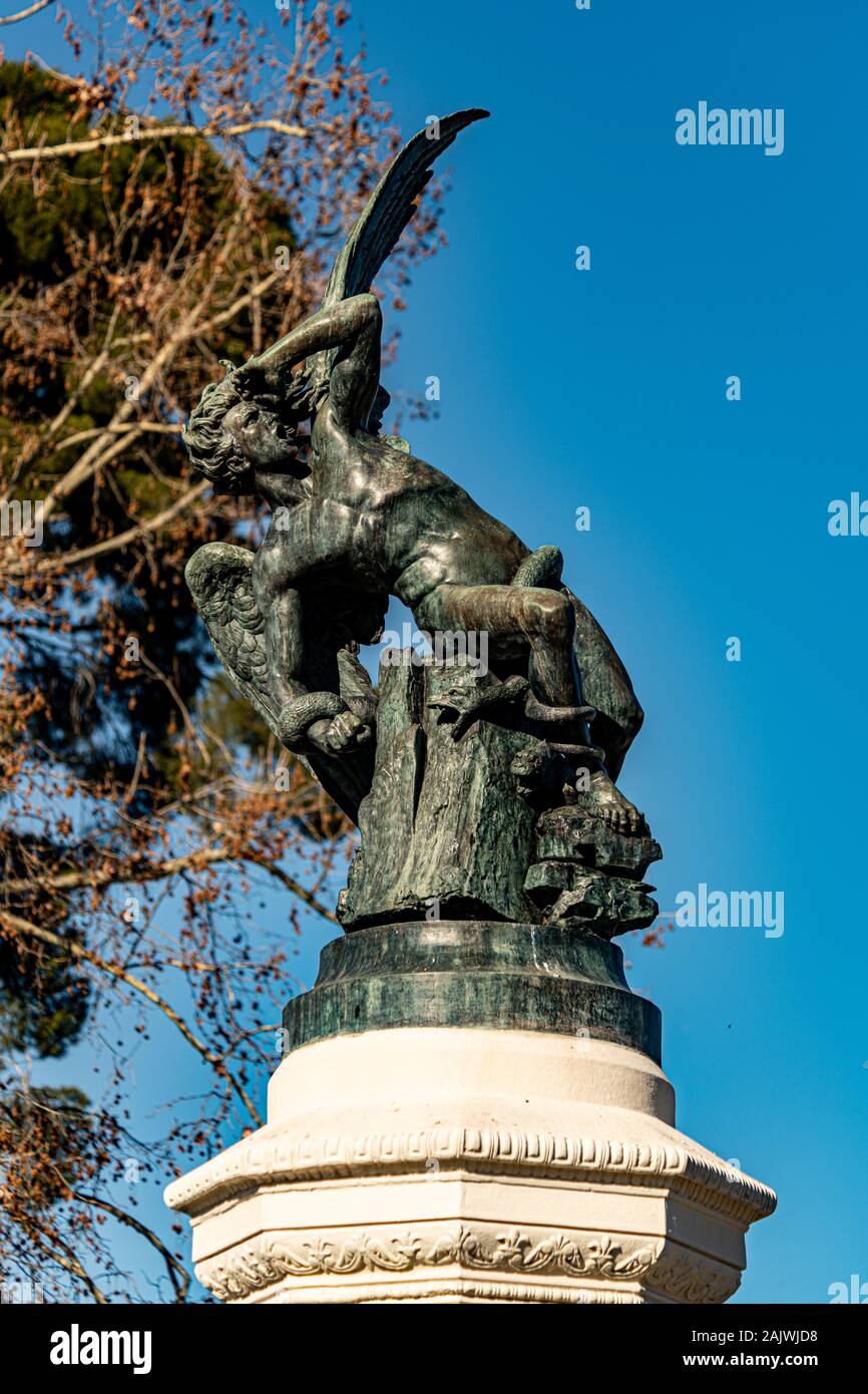 The Fallen Angel statue and fountain, El Retiro Park, Madrid, Spain