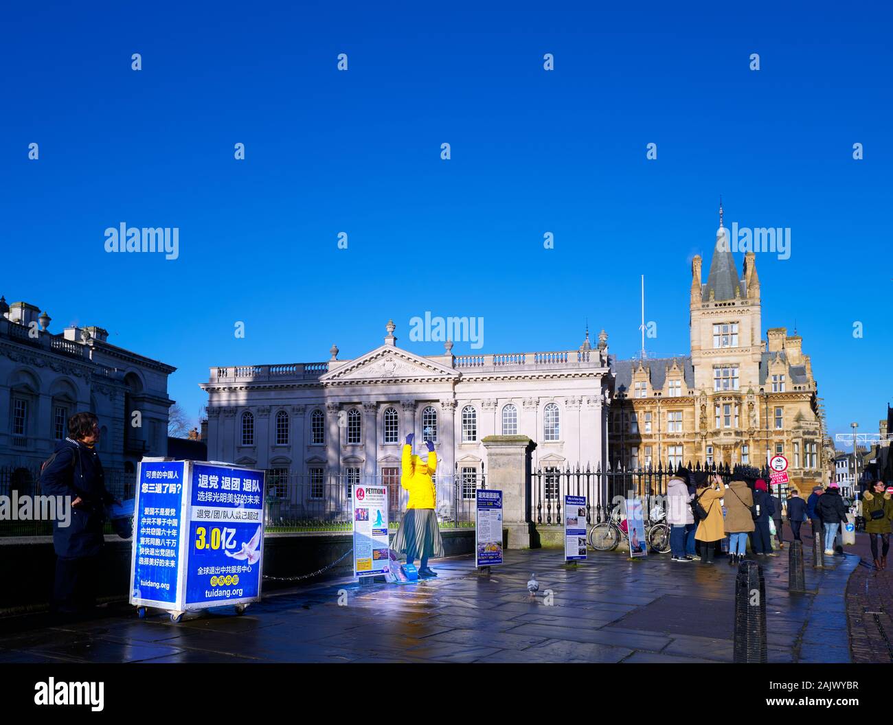 A Falun Dafa (Falun Gong) member makes a highly visible protest outside Senate House, university of Cambridge,against the chinese communist government. Stock Photo