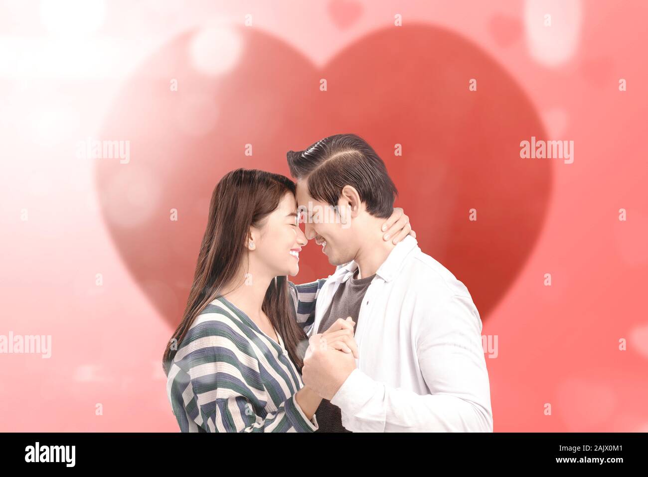 Couples holding each other hi-res stock photography and images - Alamy