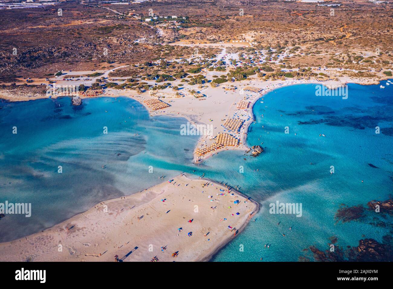 Aerial view of beautiful tropical Elafonissi Beach with pink sand. View of a nice tropical Elafonissi beach from the air. Beautiful sky, sea, resort. Stock Photo