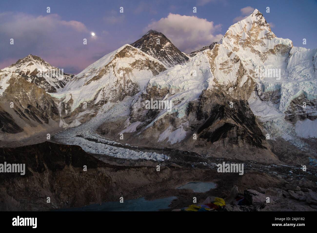 Twilight over the famous Mt Everest and Nuptse from the Kala Patthar at 5500m viewpoint in the Himalayas in Nepal Stock Photo