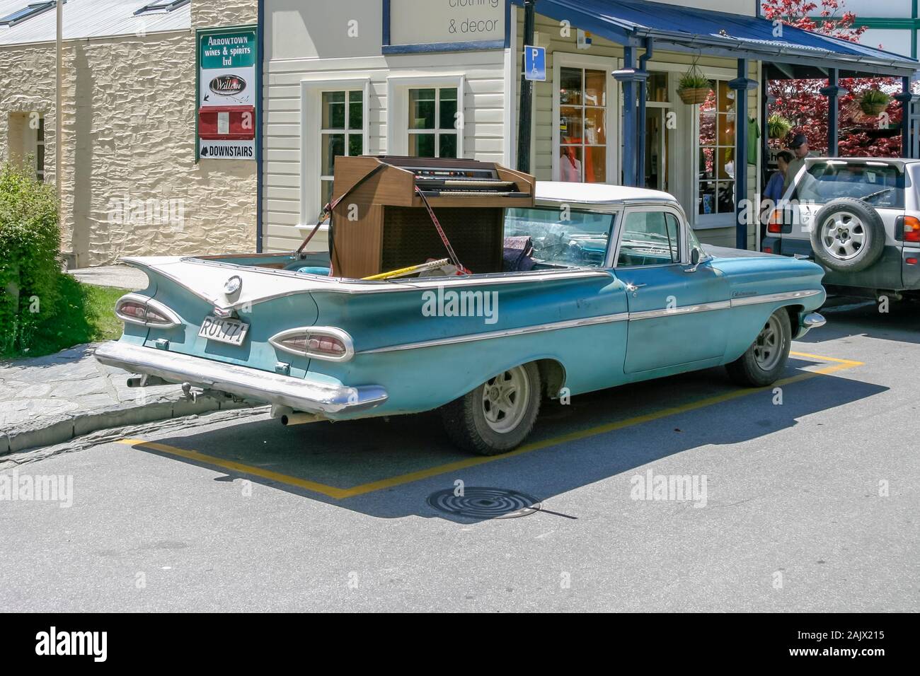 1959 Chevrolet El Camino pickup truck, parked in front of Old Gold Rush era buildings Buckingham Street, Arrowtown, Otago, South Island, New Zealand Stock Photo