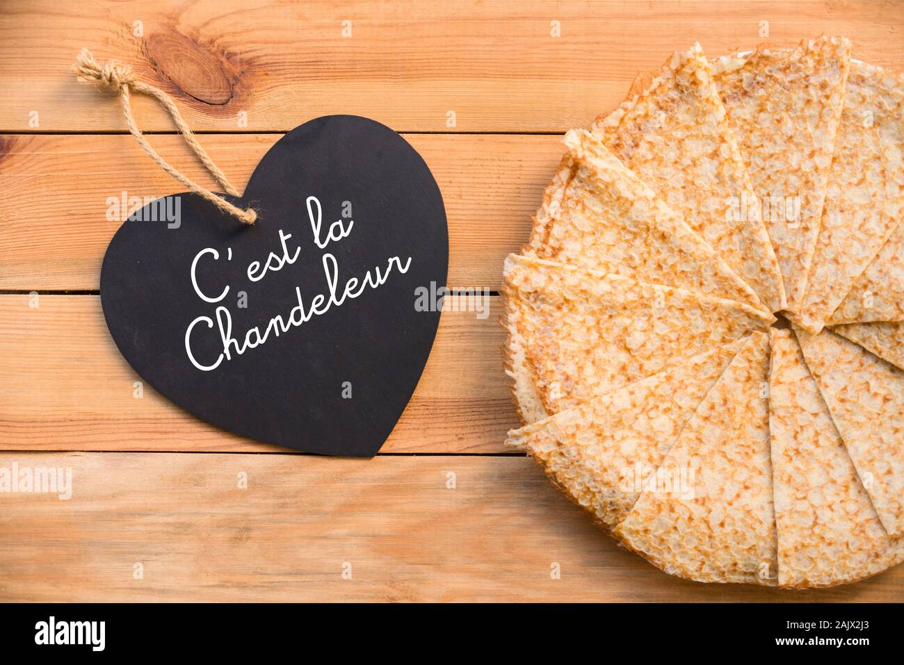 Top View Of Crepes French Pancakes Text C Est La Chandeleur In A Heart Rustic Wood Background Stock Photo Alamy