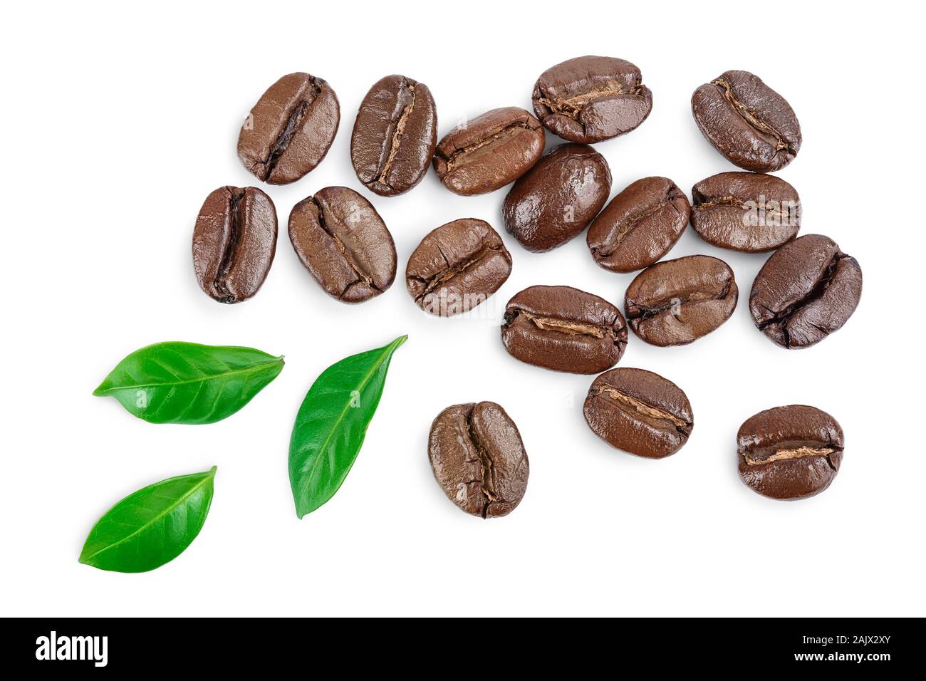Heap of roasted coffee beans with leaves isolated on white background ...