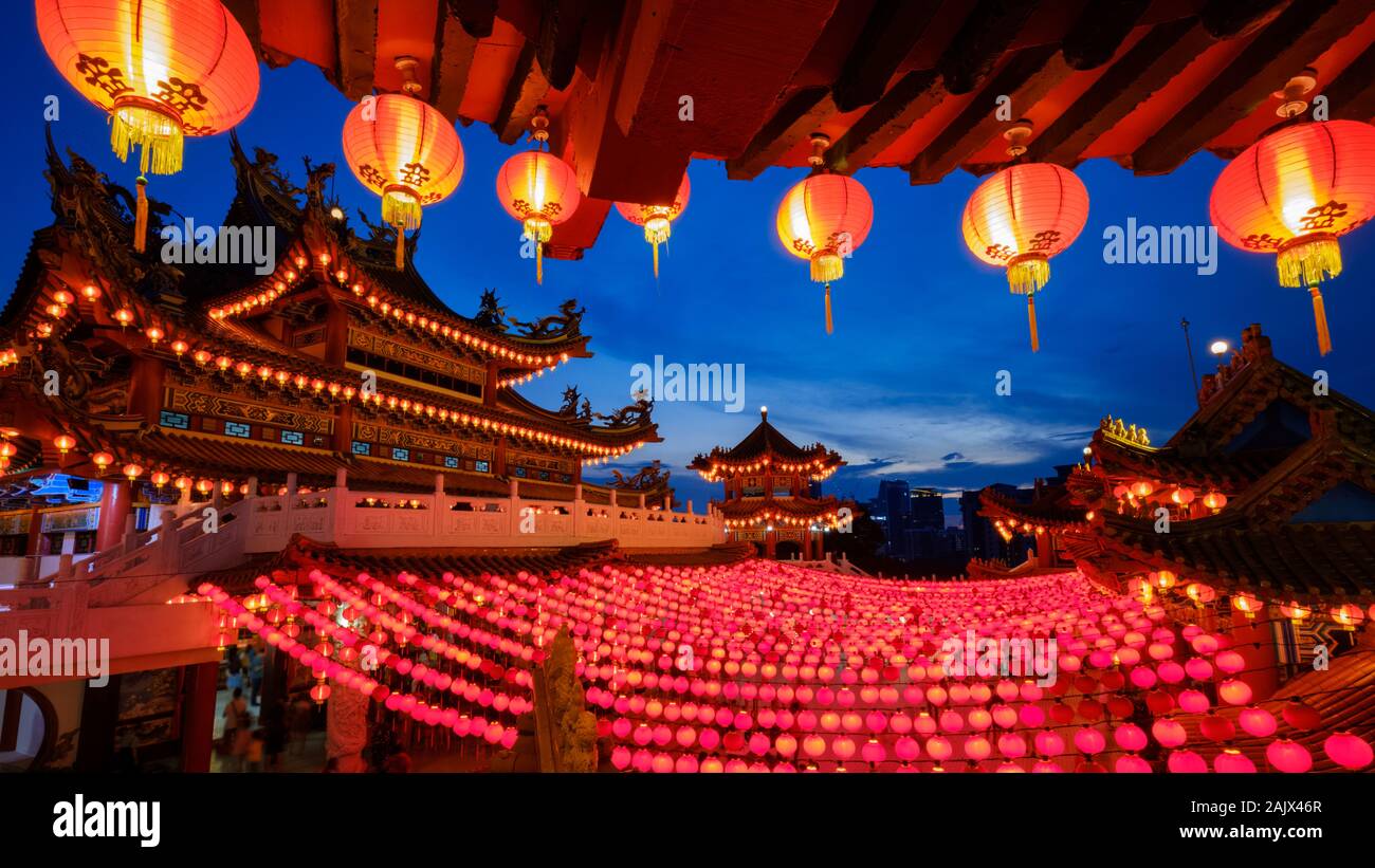 Chinese temple with hanging red lantern decoration with blue sky in ...