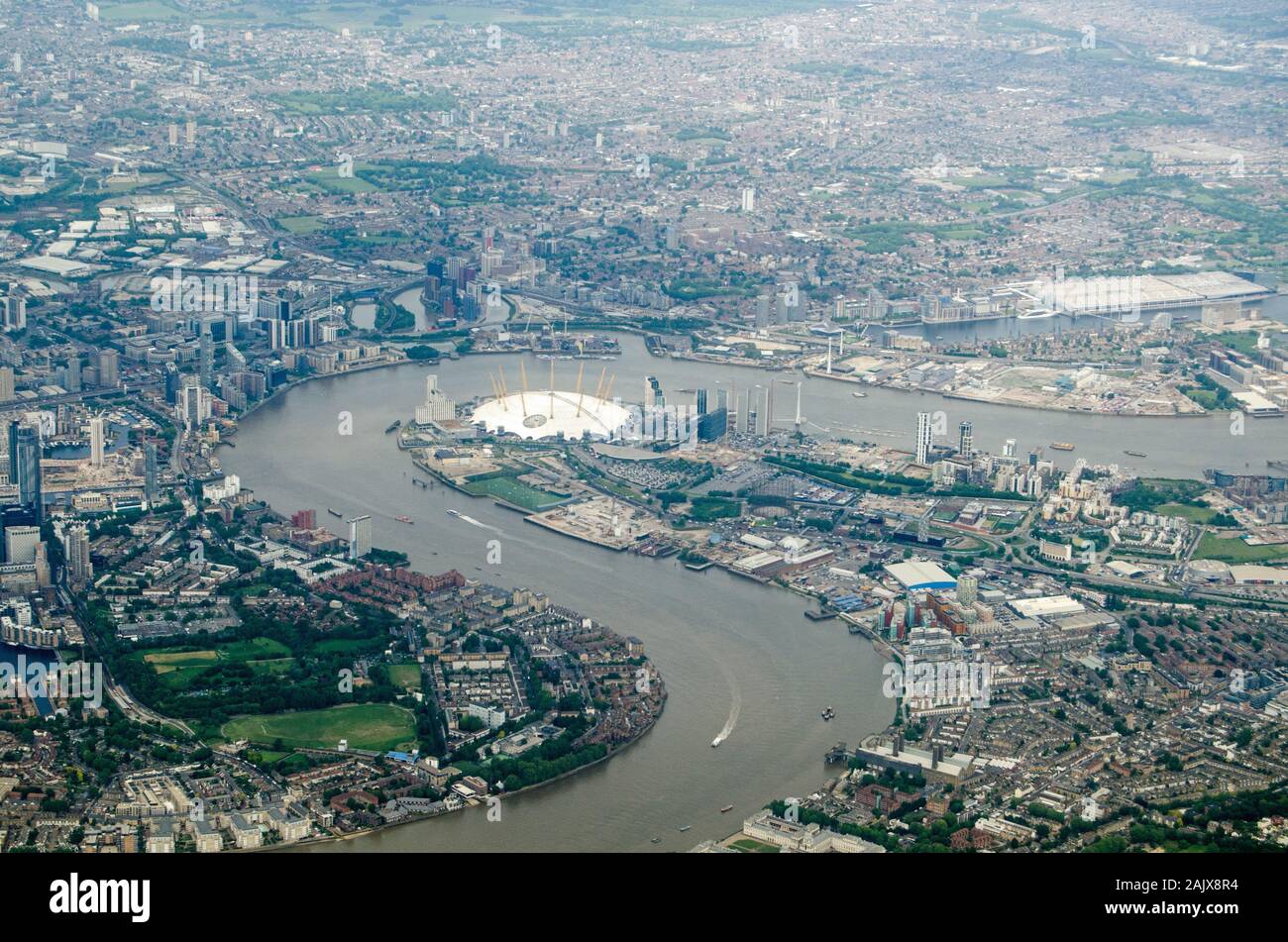 Aerial view of the River Thames at North Greenwich, London.  The millennium dome is in the centre of the image with the new arts development of City I Stock Photo