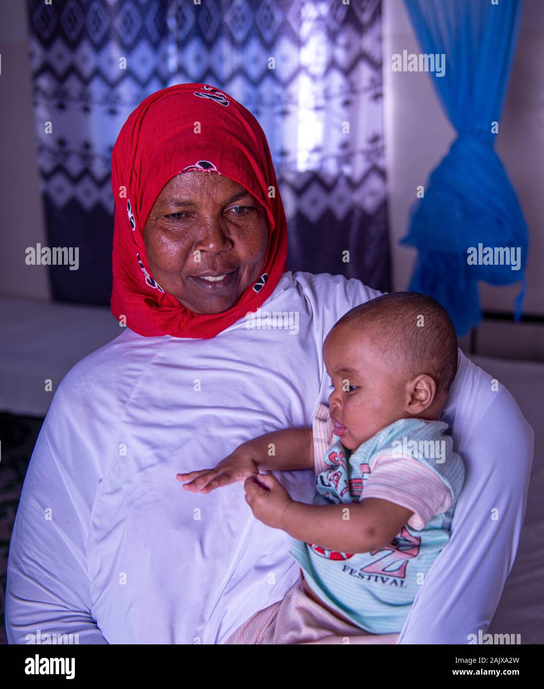 Midwife and sick child, Somaliland Stock Photo