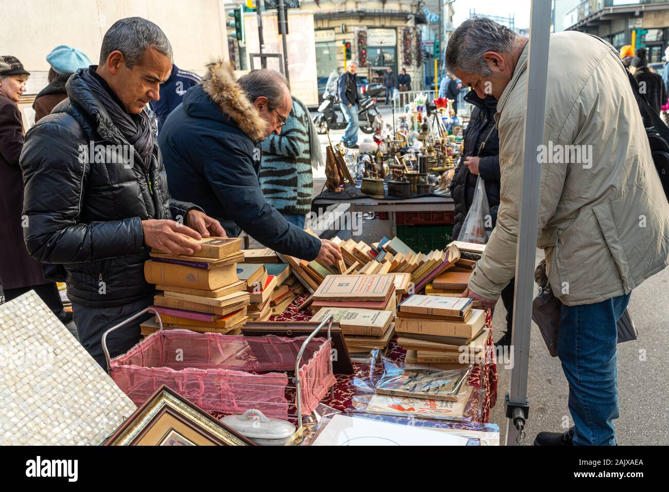 elderly people at the second-hand book stall. flea market. Pescara, Abruzzo, Italy Stock Photo